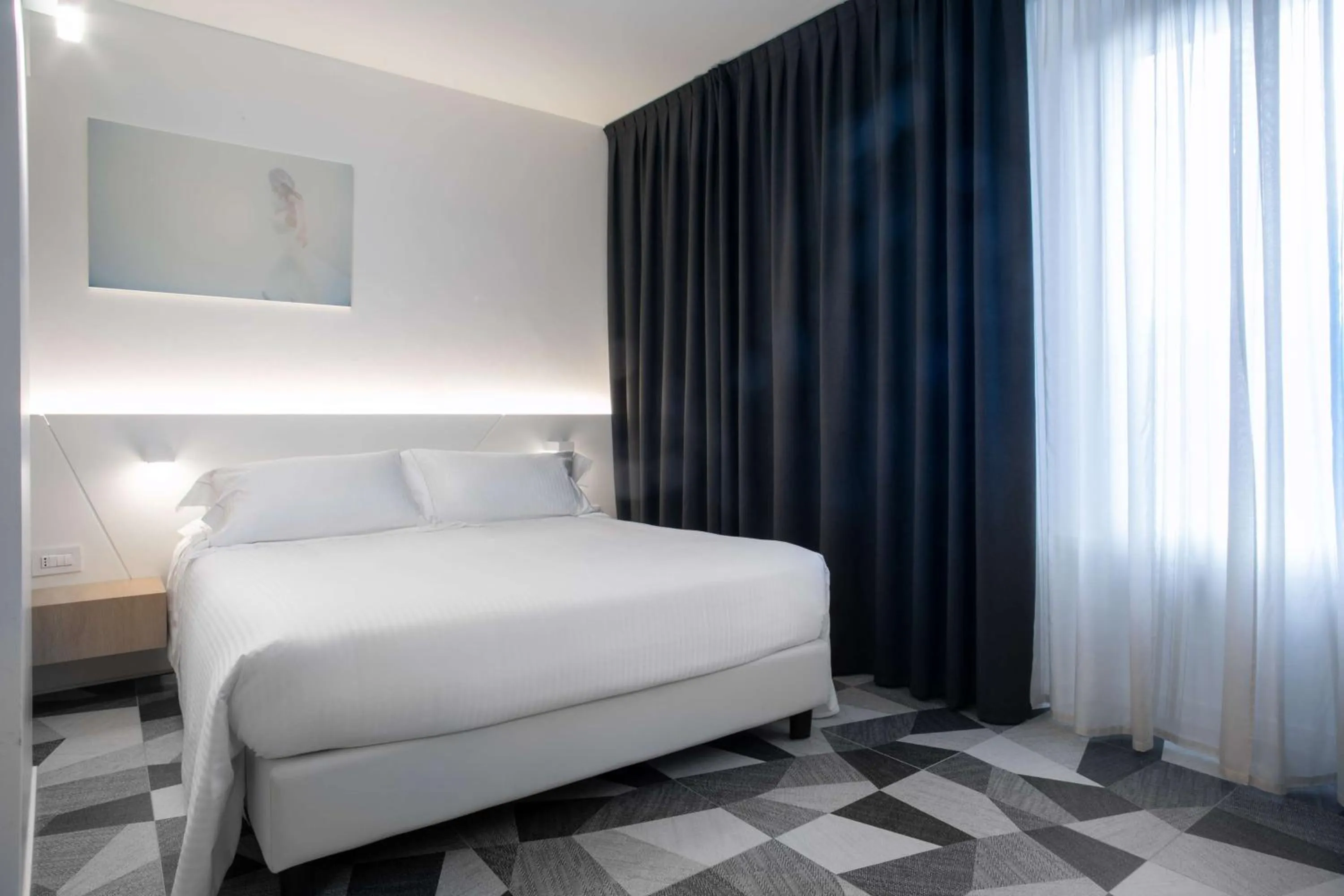Deluxe Room with One Queen Bed and One Single Bed in Hotel Cappello D'Oro, BW Signature Collection