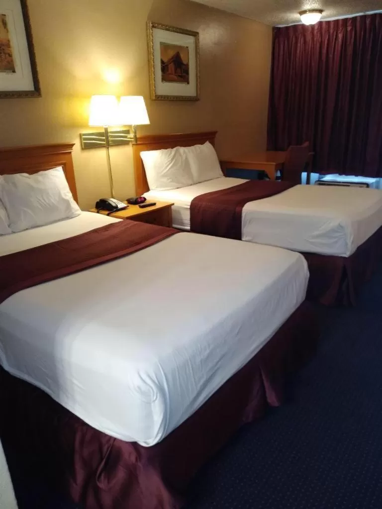 Standard Room with Two Double Beds - Smoking in Knights Inn San Antonio near AT&T Center
