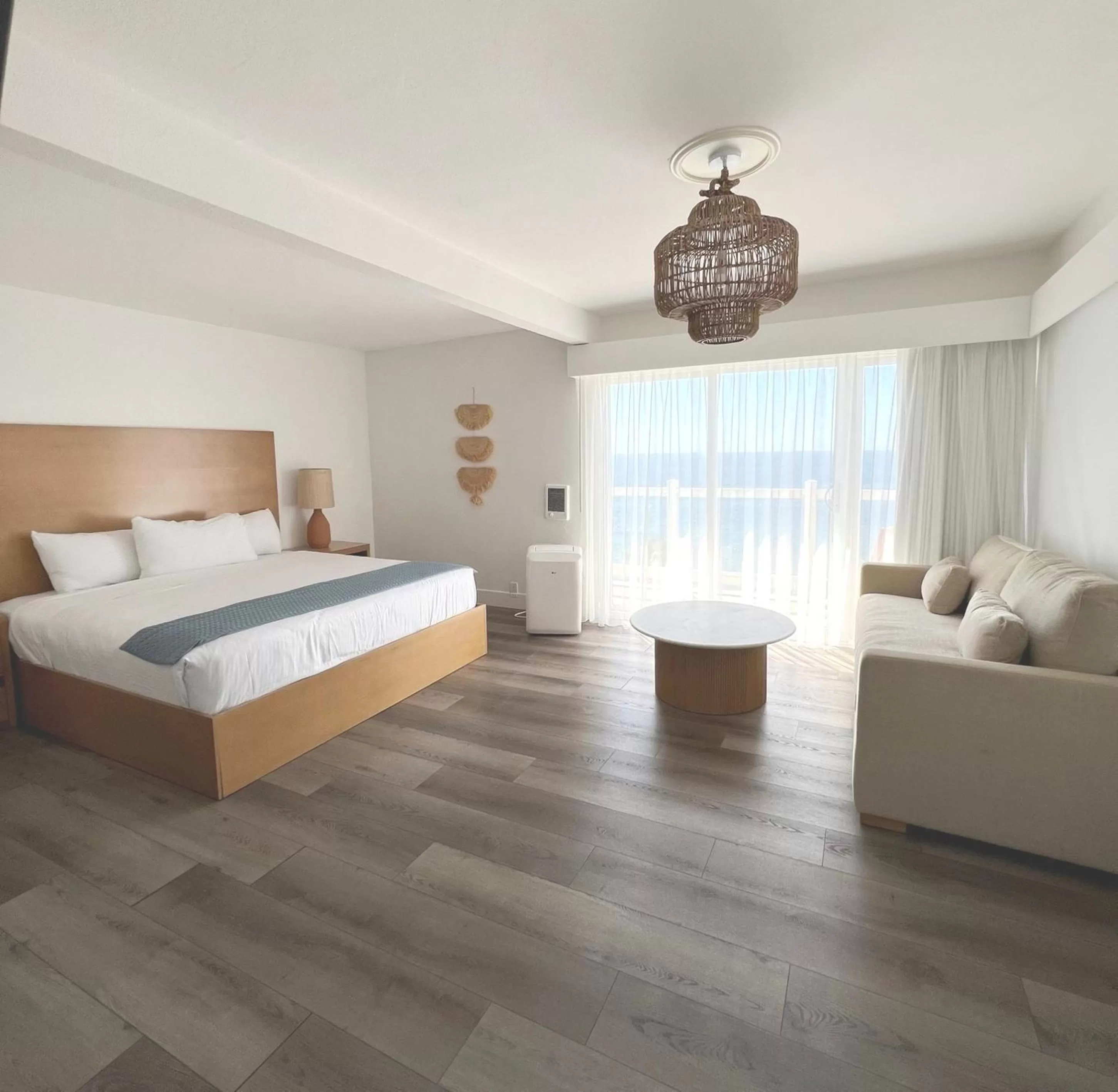 King with Sofa Sleeper - Ocean Front  in Capri Laguna on the Beach - A Boutique Hotel