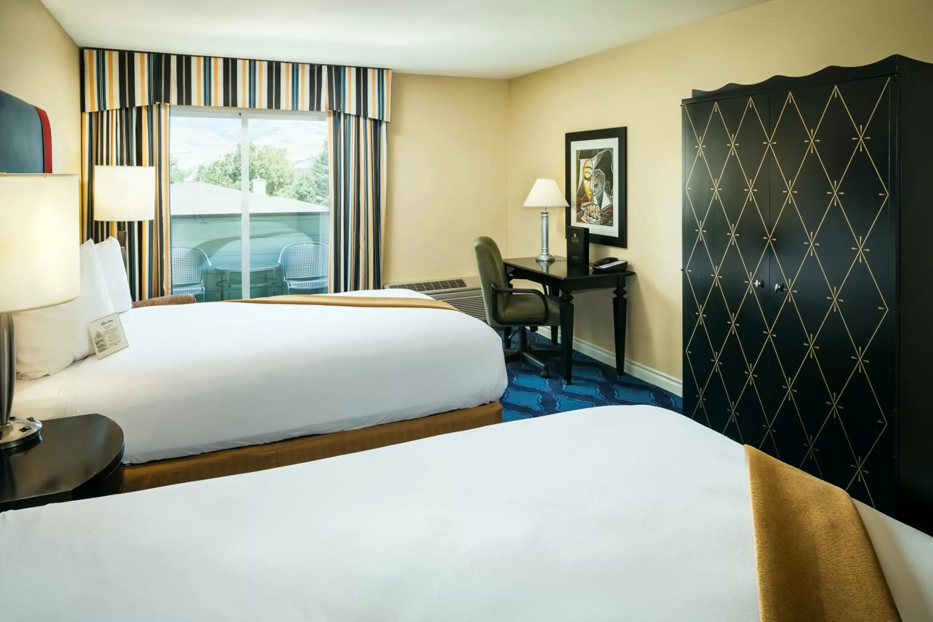 Deluxe Queen Room with Two Queen Beds in Plaza Inn & Suites at Ashland Creek