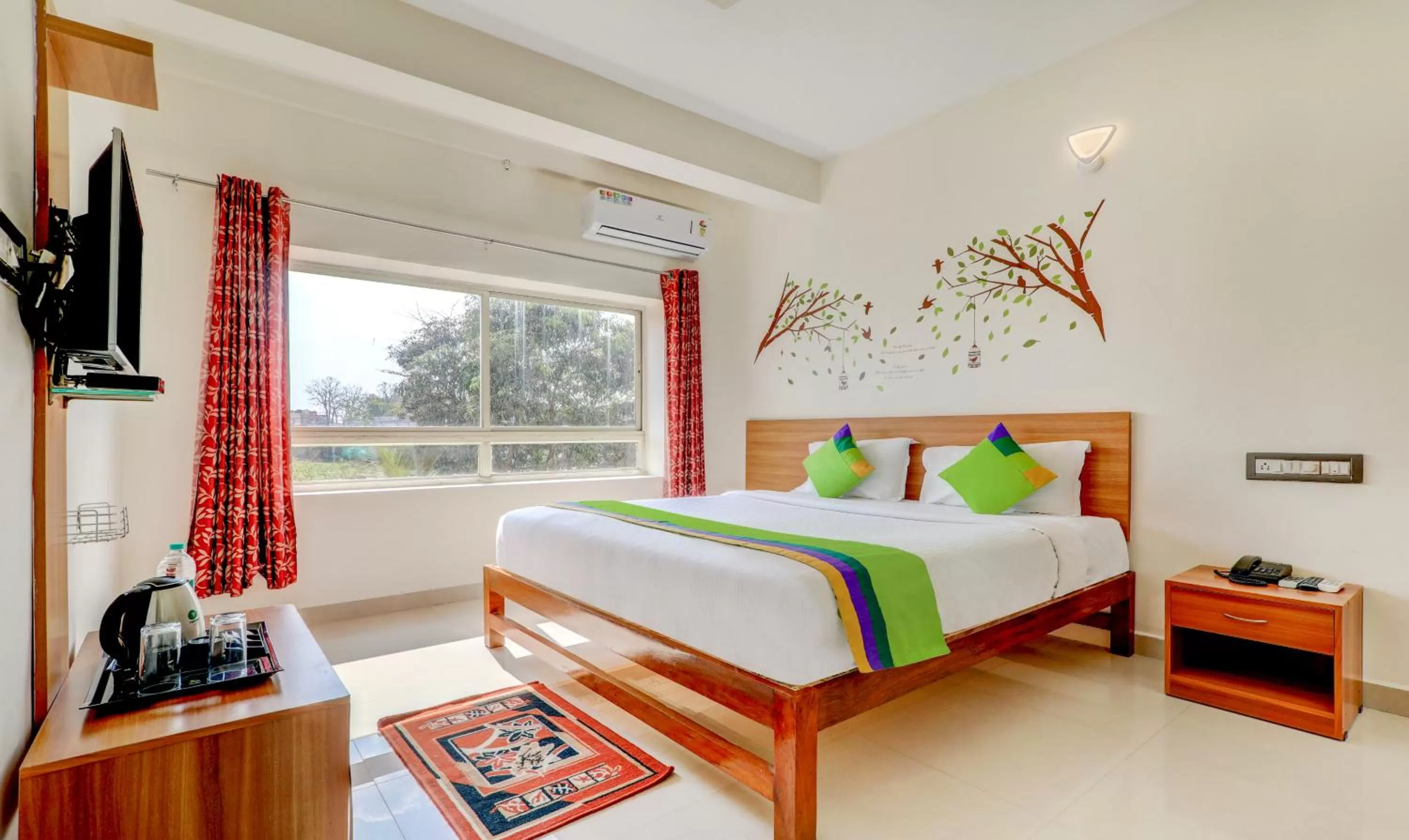 Standard Room in Treebo Atithi Comforts, 1 Km From Nisargadhama Forest
