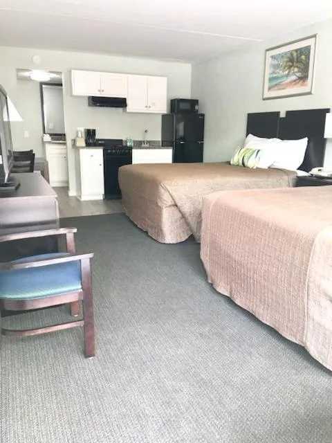 Queen Room with Two Queen Beds and Kitchenette in Ocean Plaza Motel