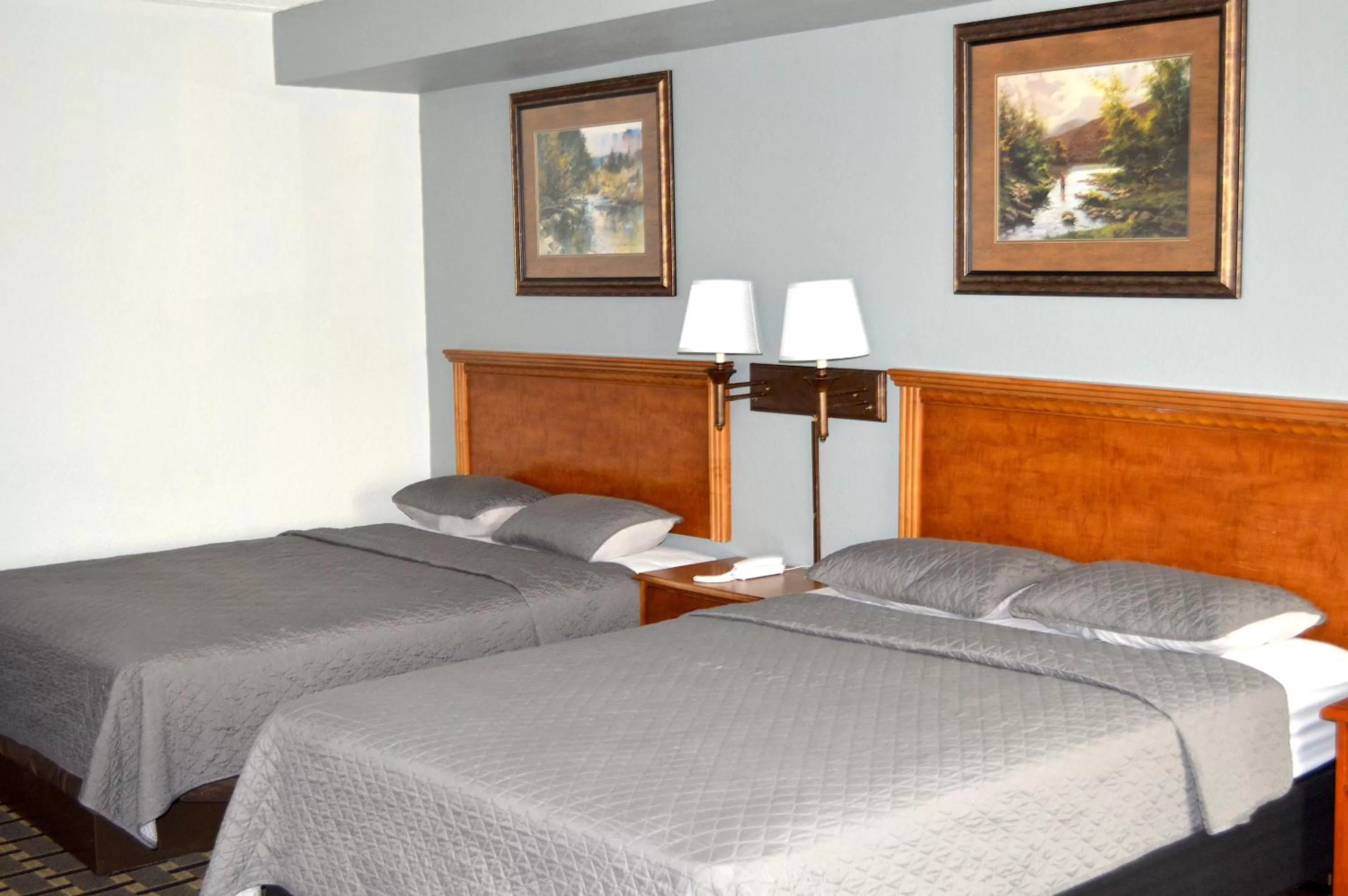 Two Double Beds Family Suite Non-Smoking in Americas Best Value Inn and Suites St. Cloud