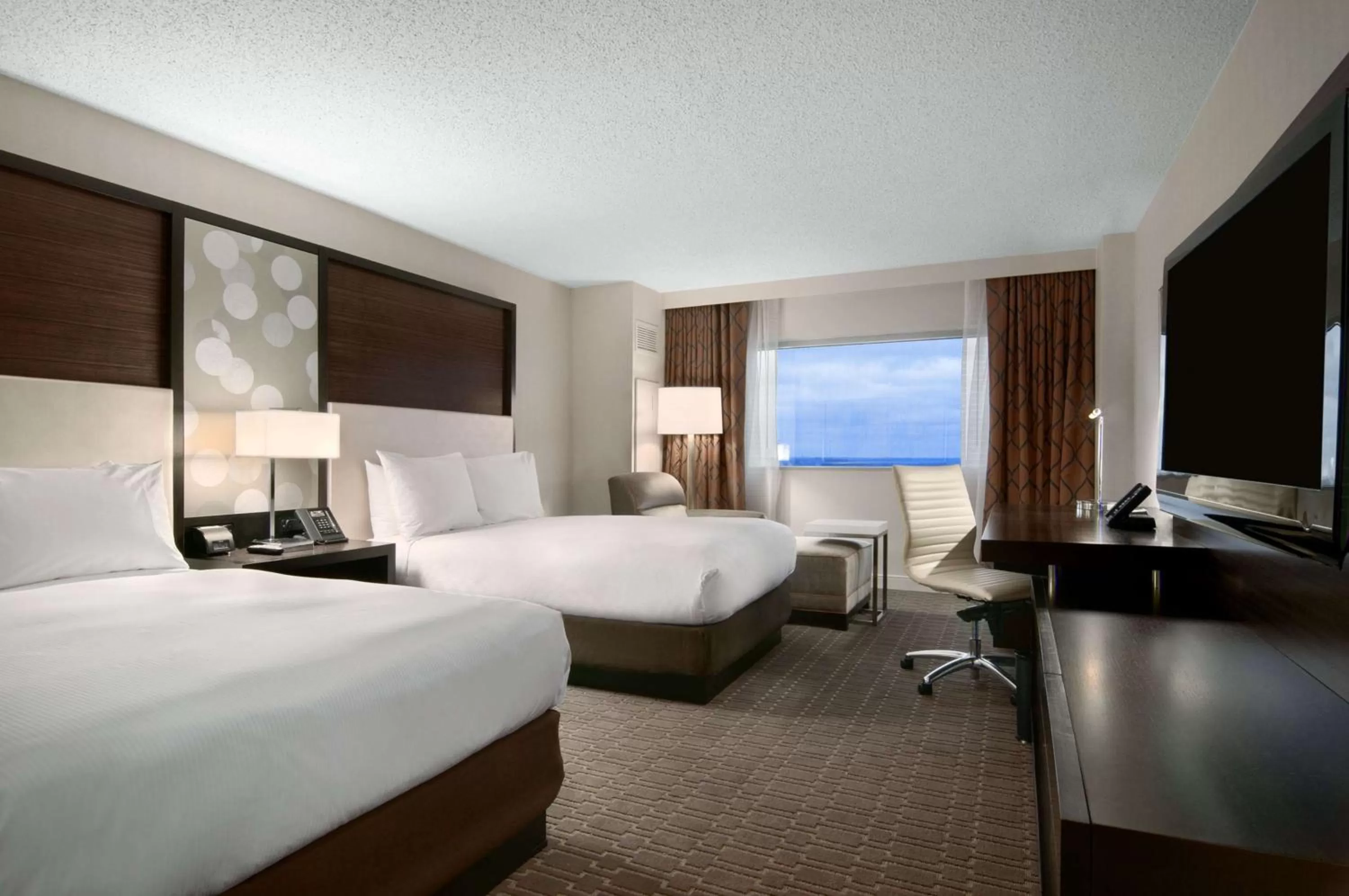 Queen Room with Two Queen Beds, City View and Airport Runway View in Hilton Atlanta Airport