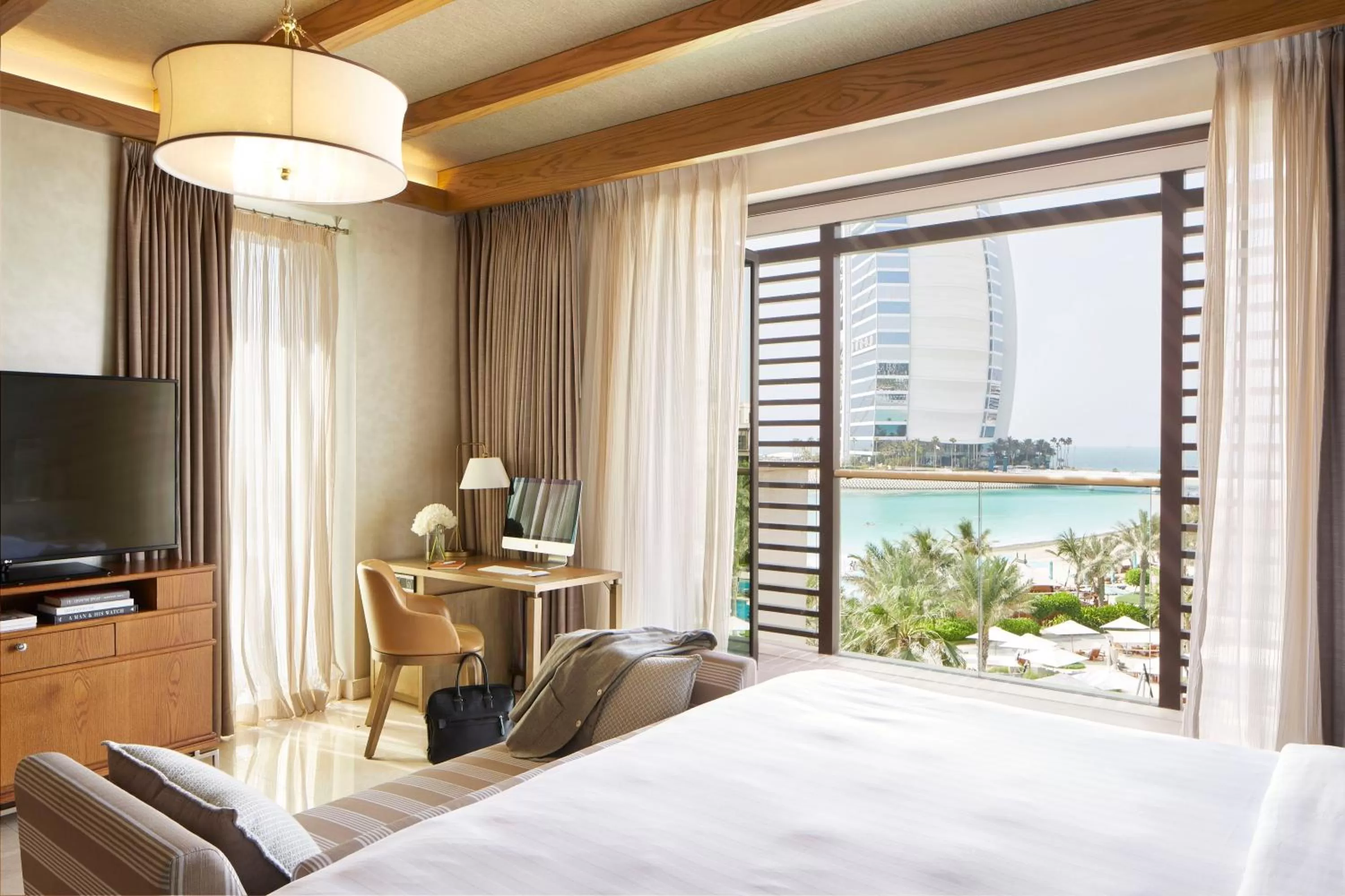 Burj View Suite - with airport transfers, suite benefits and beach club access in Jumeirah Al Naseem Dubai