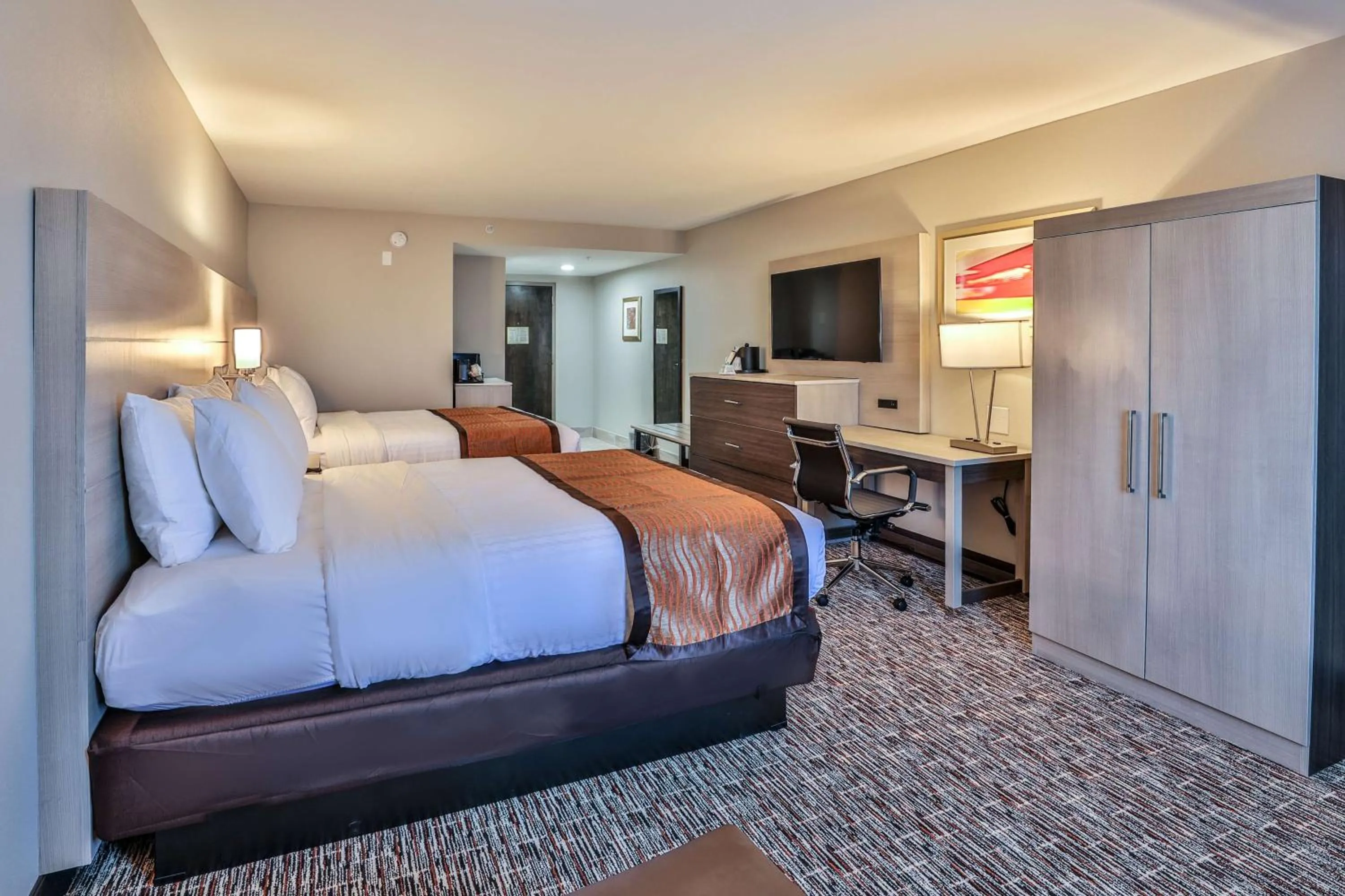 Queen Room with Two Queen Beds and Mobility Accessible Roll-In Shower in Best Western Plus Executive Residency Nashville