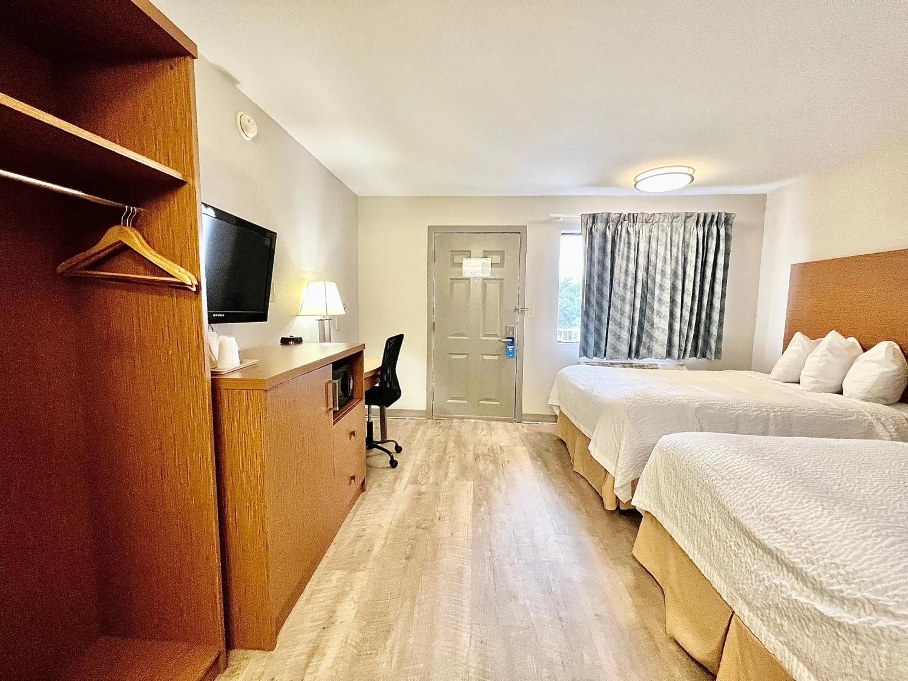 Room with Two Full Size Beds - Non-Smoking in Days Inn & Suites by Wyndham Arlington Near Six Flags