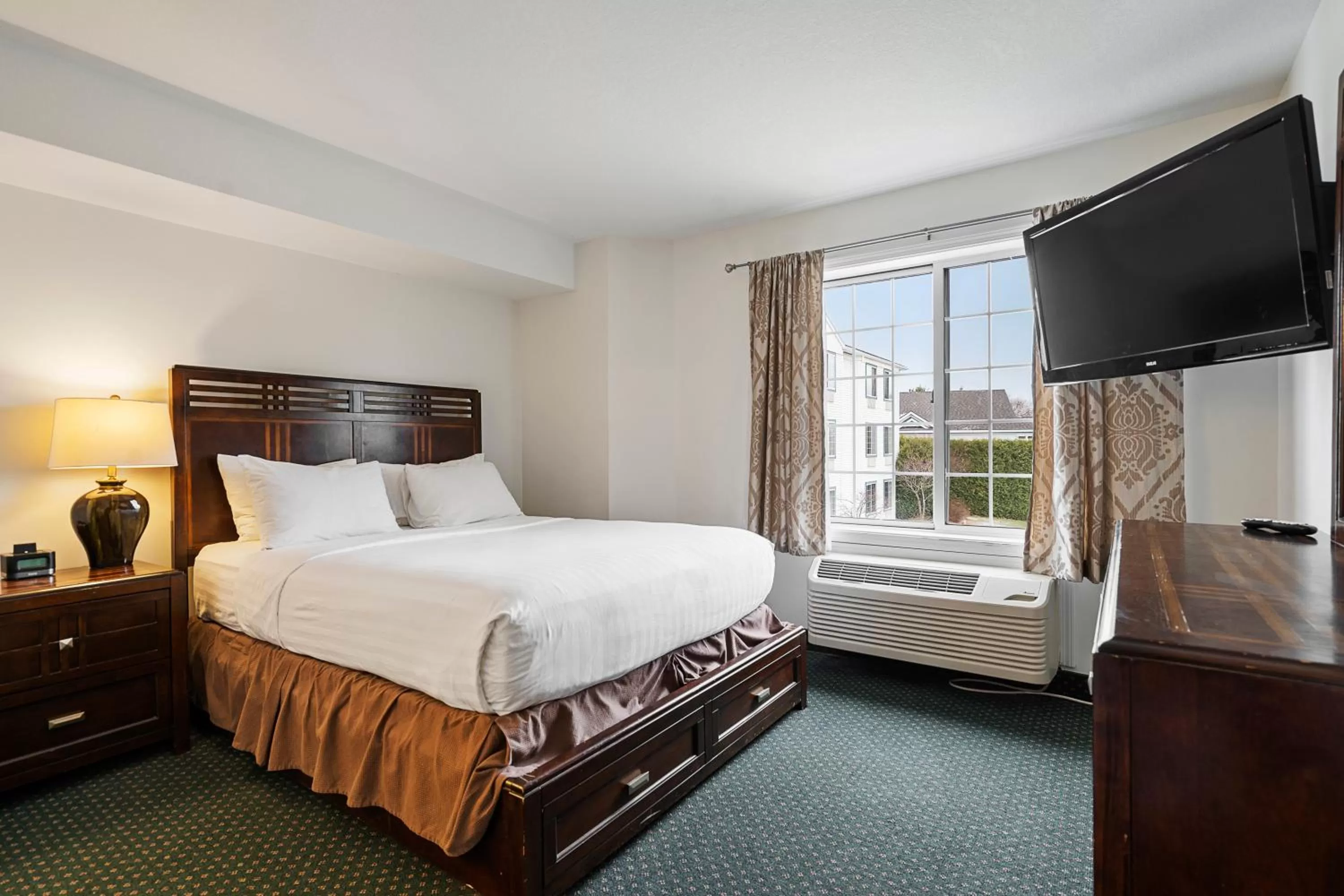 Queen Room with Courtyard View in Charlevoix Inn & Suites SureStay Collection by Best Western
