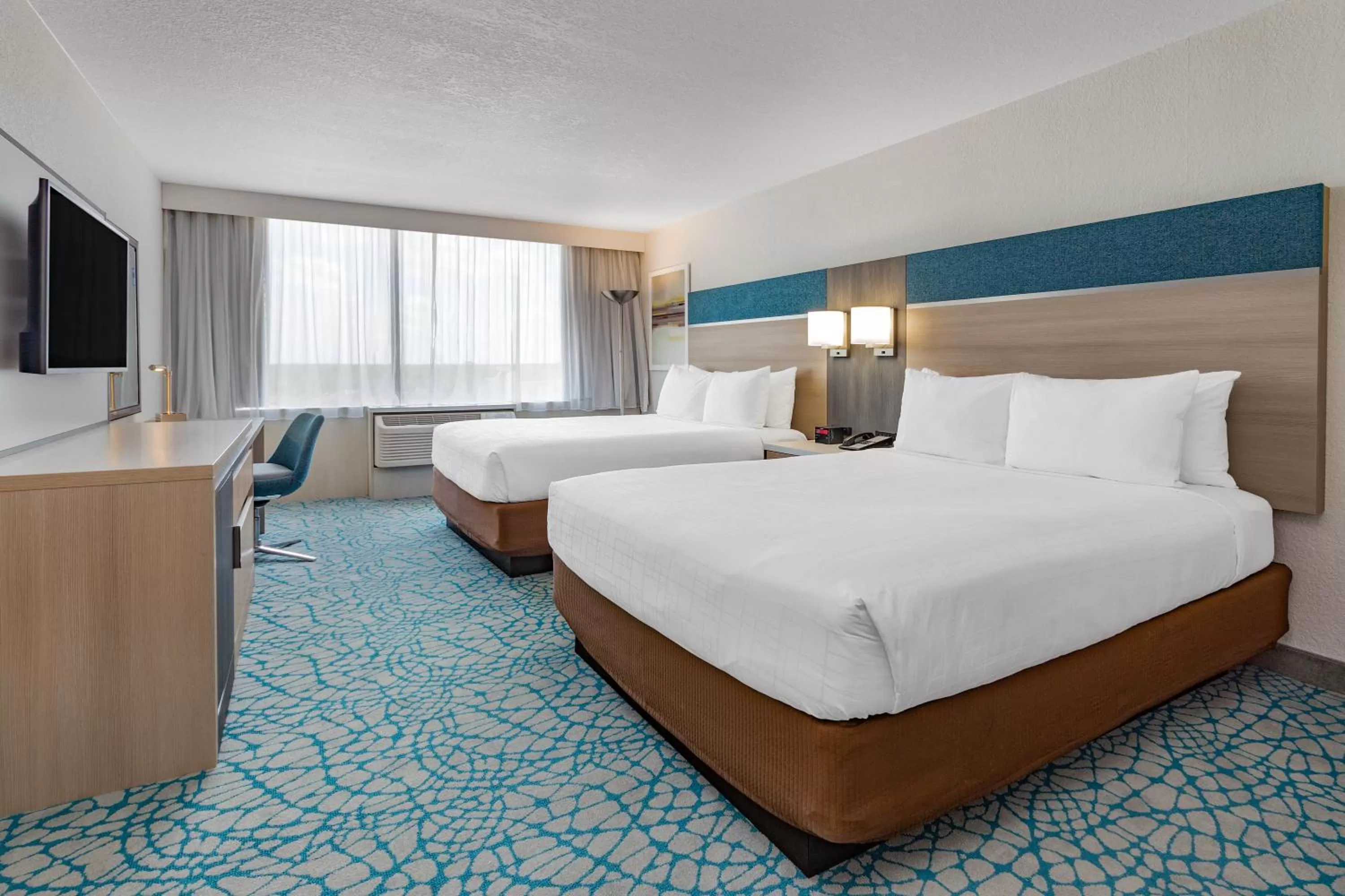 Queen Suite with Three Queen Beds in Wyndham Orlando Resort & Conference Center, Celebration Area