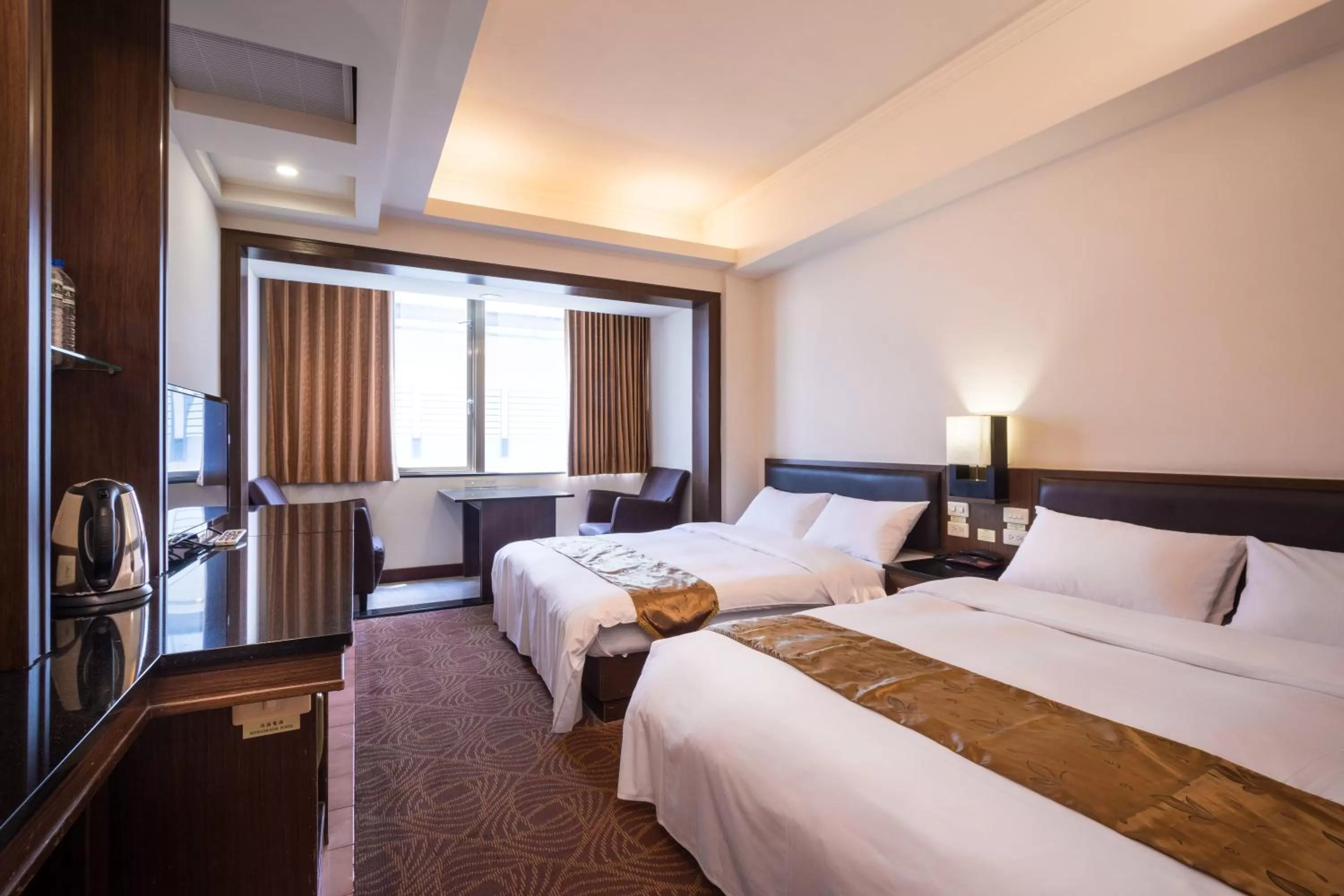 Deluxe Quadruple Room in Twinstar Hotel