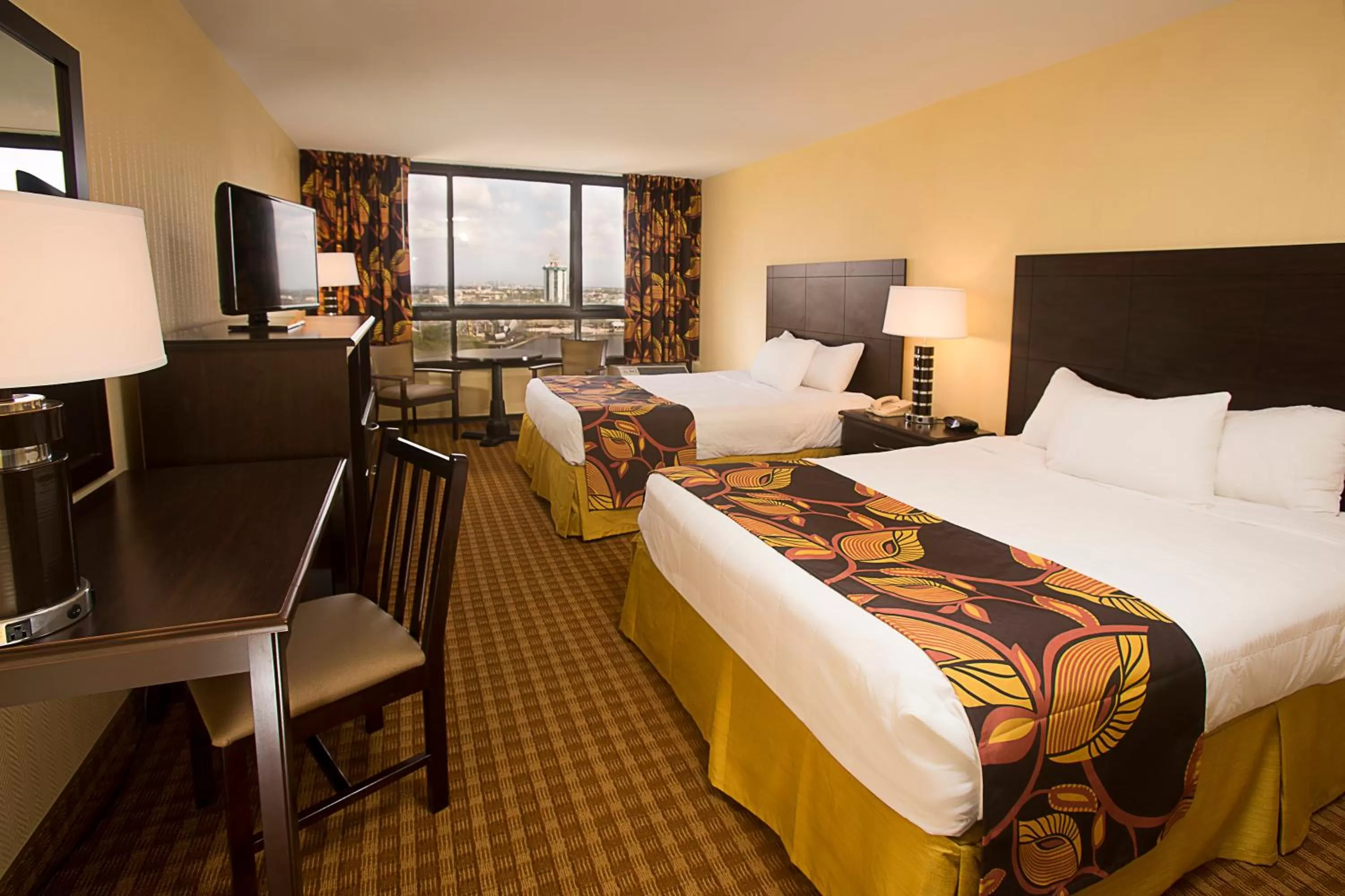 Queen Room with Two Queen Beds - High Floor (No Resort Fee) in Ramada Plaza by Wyndham Orlando Resort & Suites Intl Drive - Newly Renovated!