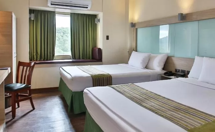 Queen Room with Two Queen Beds - Non-Smoking in Microtel by Wyndham Baguio