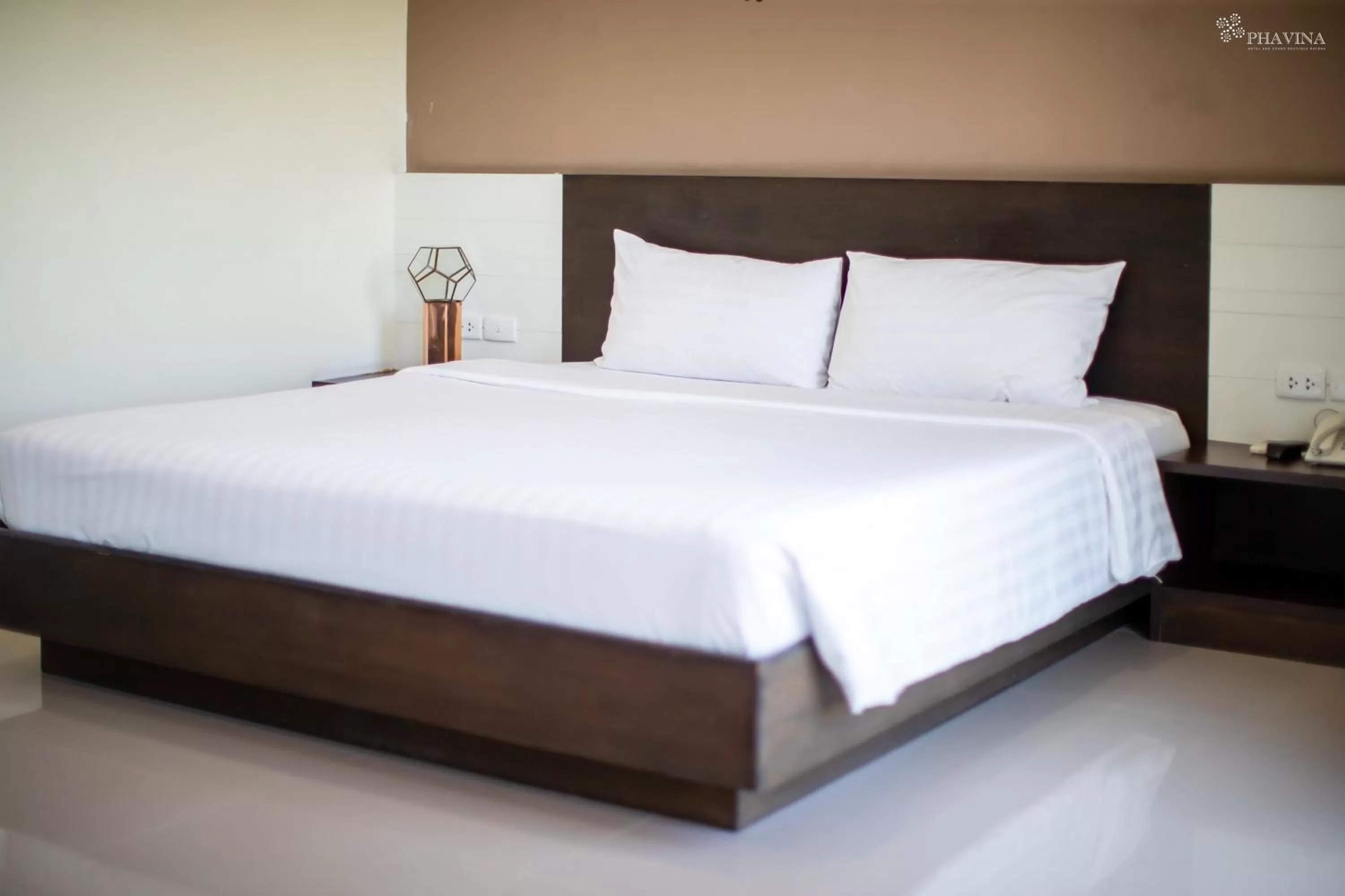 Bed in Phavina Hotel & Grand Boutique Rayong