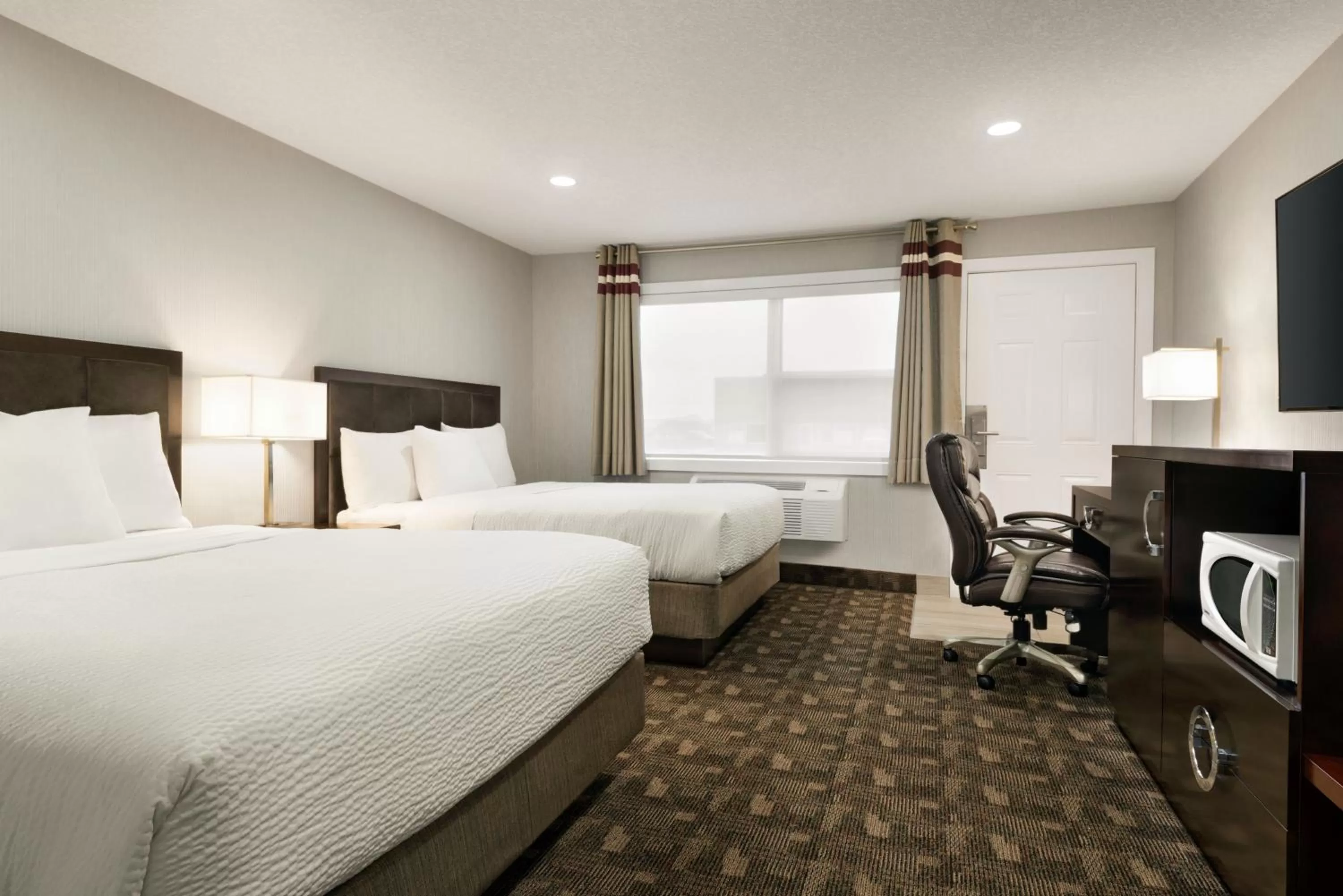 Queen Room with Two Queen Beds - Non-Smoking in Days Inn by Wyndham Wainwright