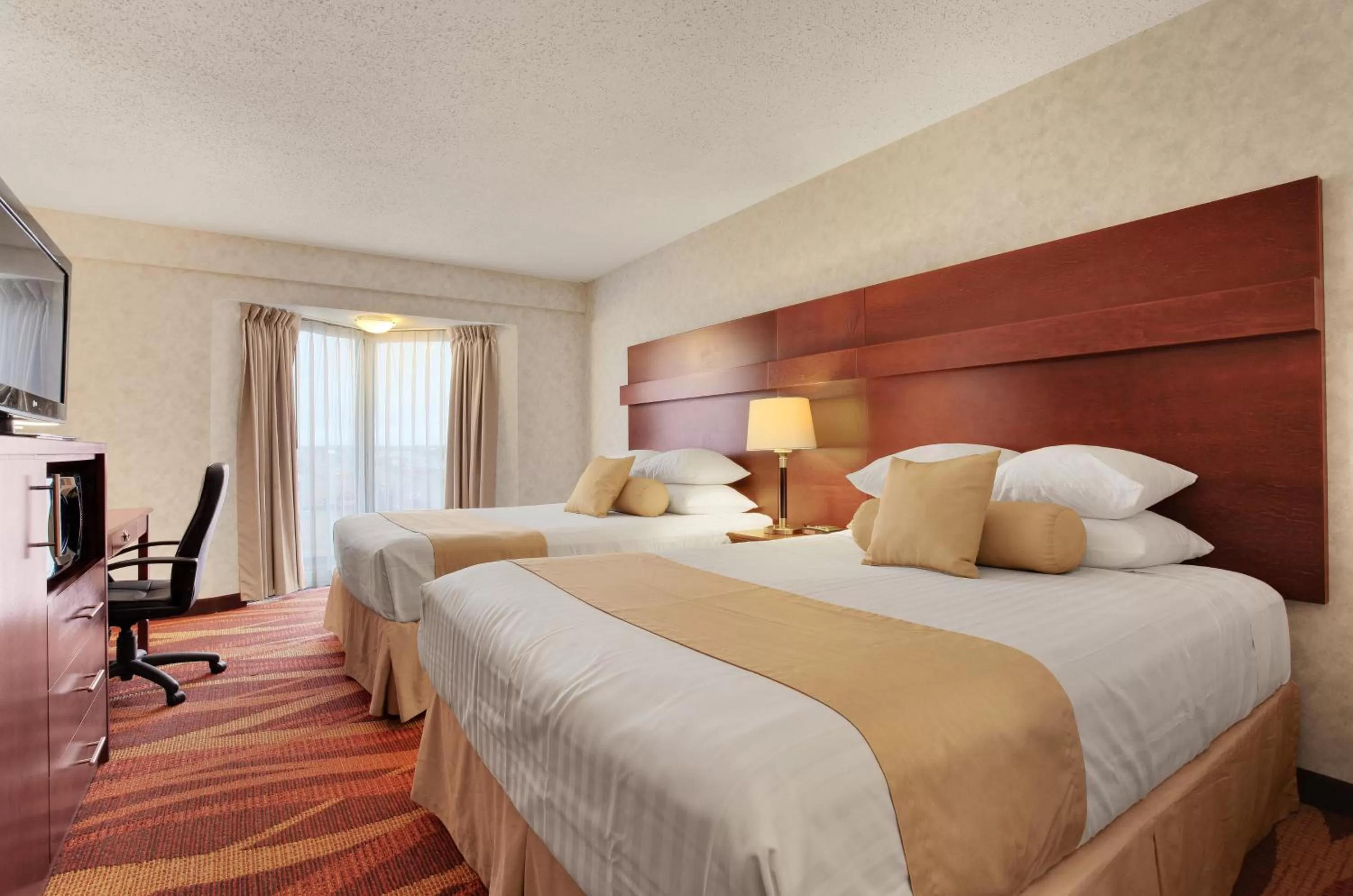 Queen Room with Two Queen Beds - Non-Smoking in Travelodge by Wyndham Lloydminster