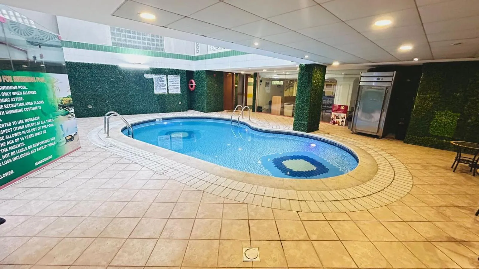 Swimming pool in Queens Hotel Next Sabkha Bus Station