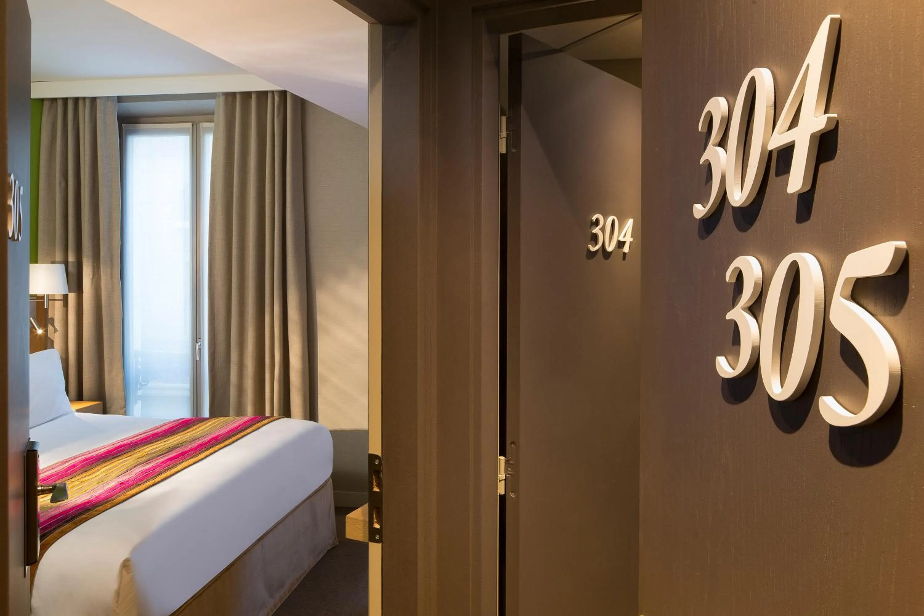 2 Adjacent Comfort Rooms in Hôtel Cordelia Opéra-Madeleine