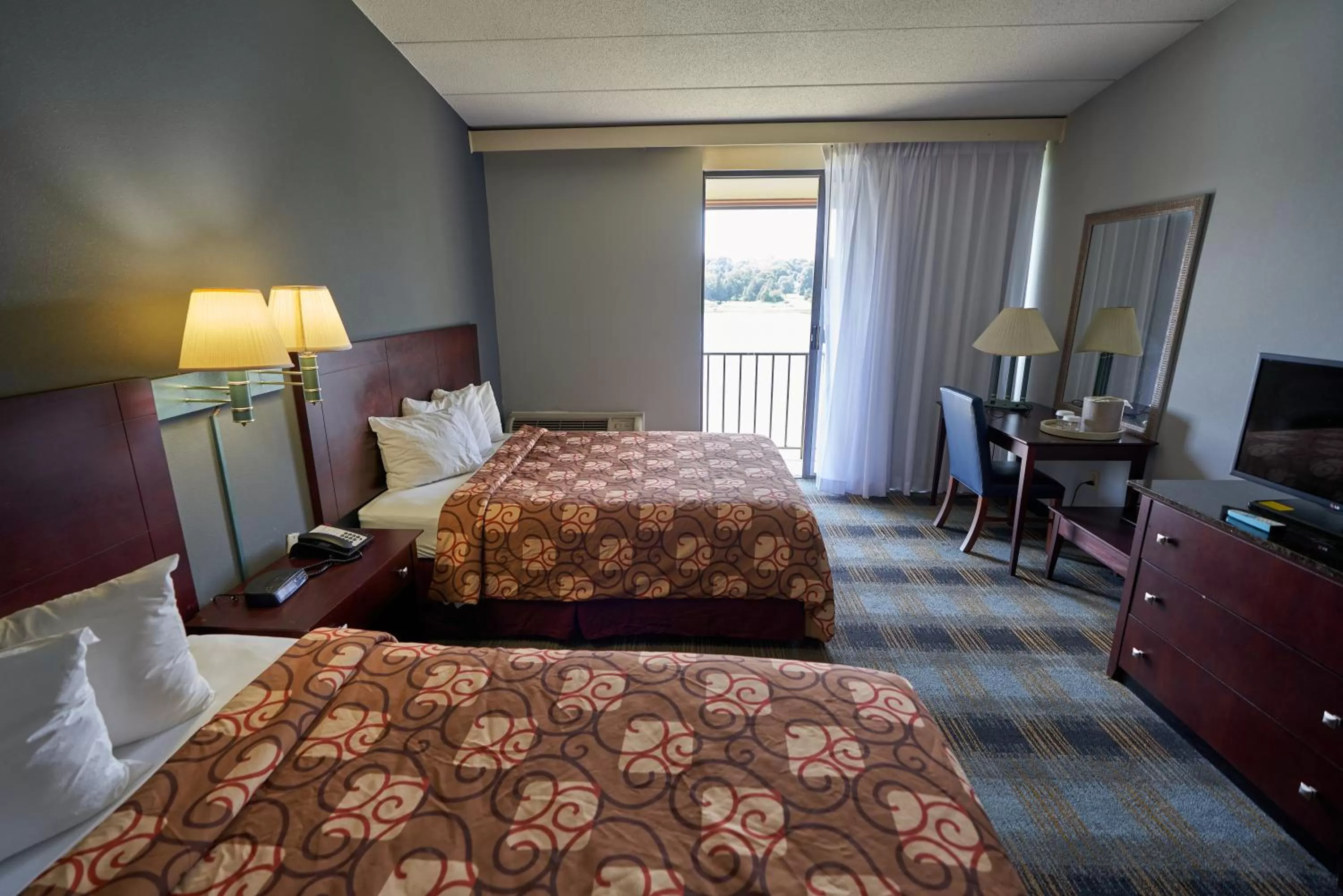 Courtyard Room with Two Queen Beds - Garden/River View in Riverview Inn & Suites