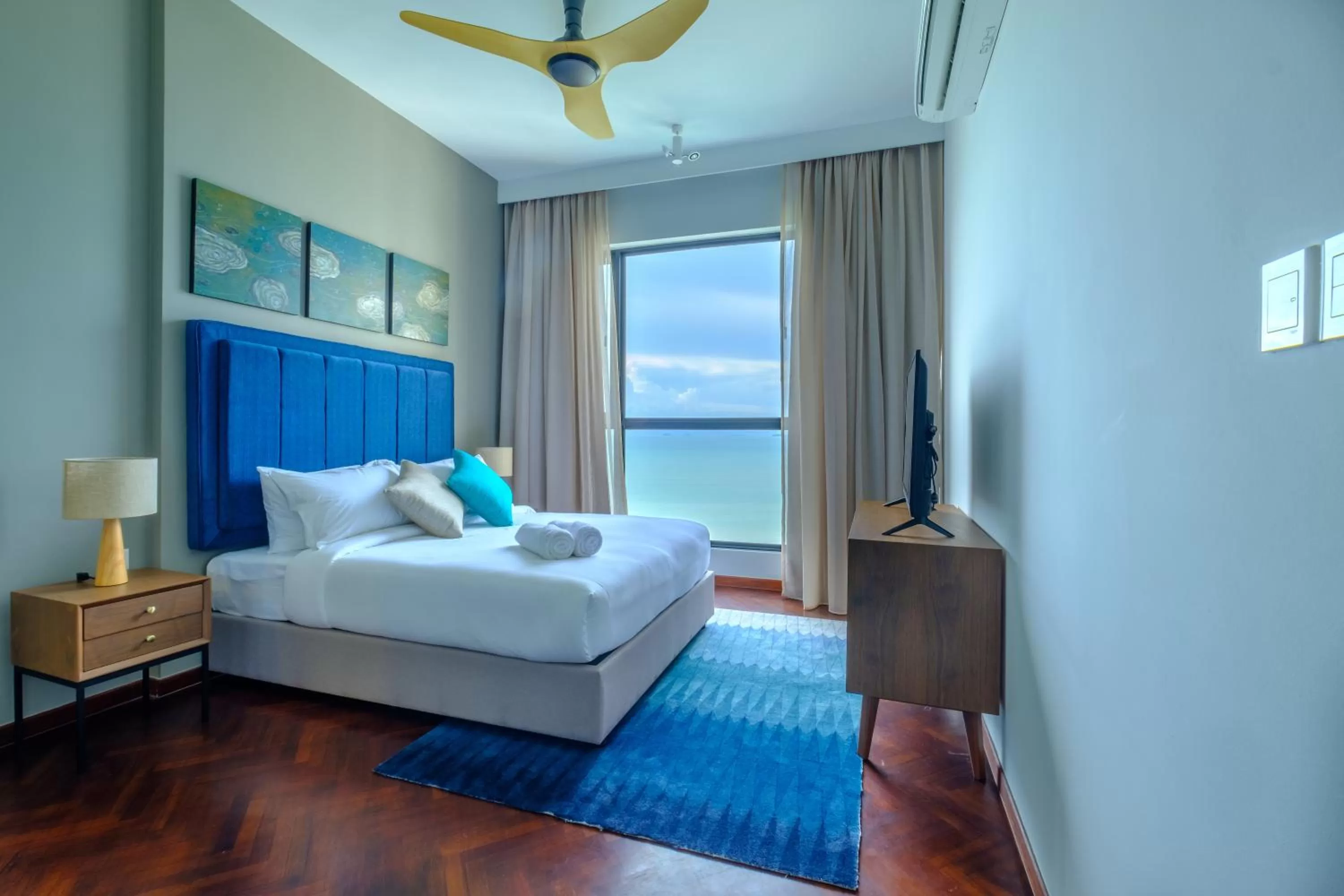 Three-Bedroom Apartment with Sea View in Tanjung Point Residences