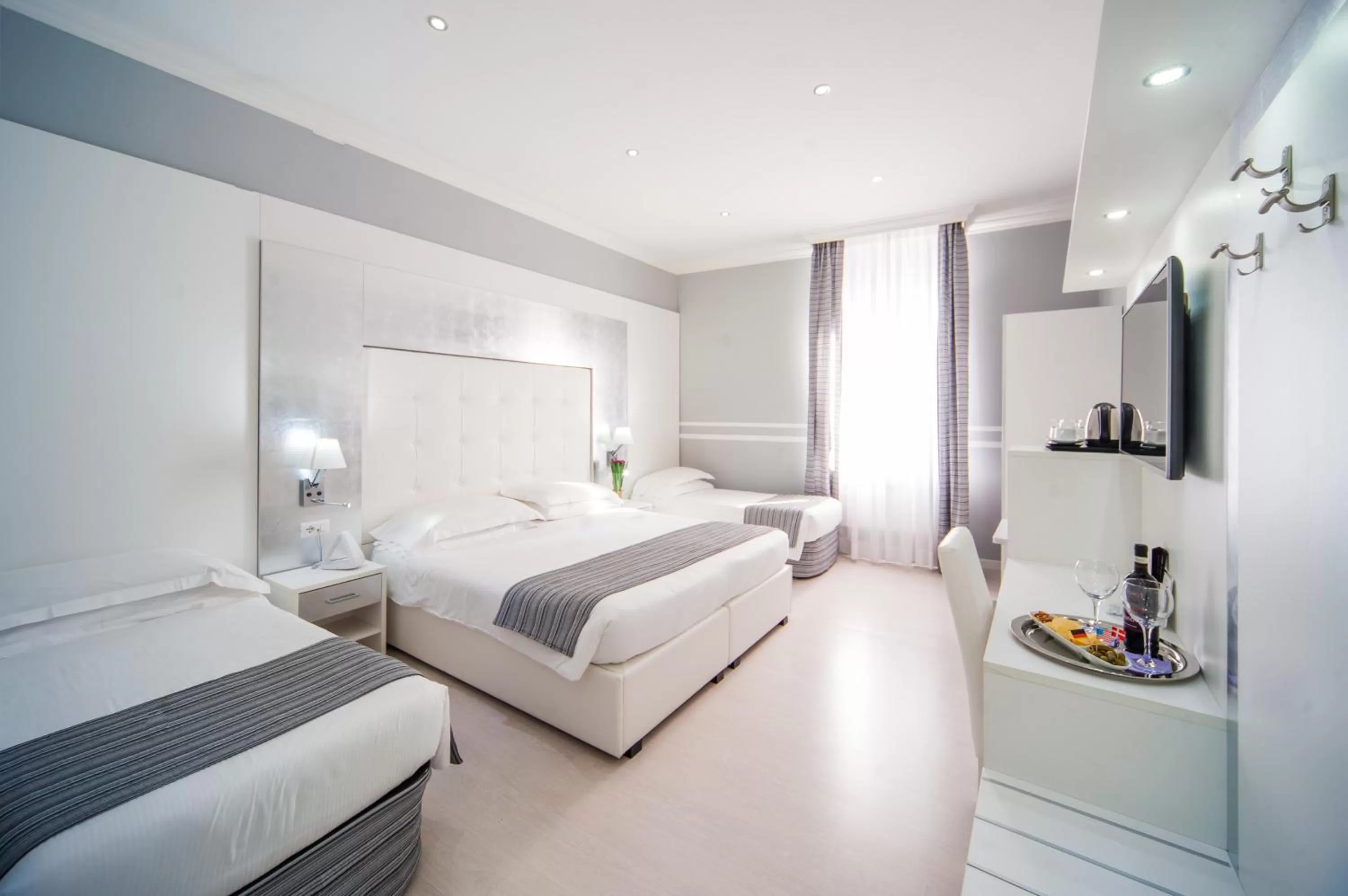 Deluxe Quadruple Room in Relais Trevi 95 Boutique Hotel