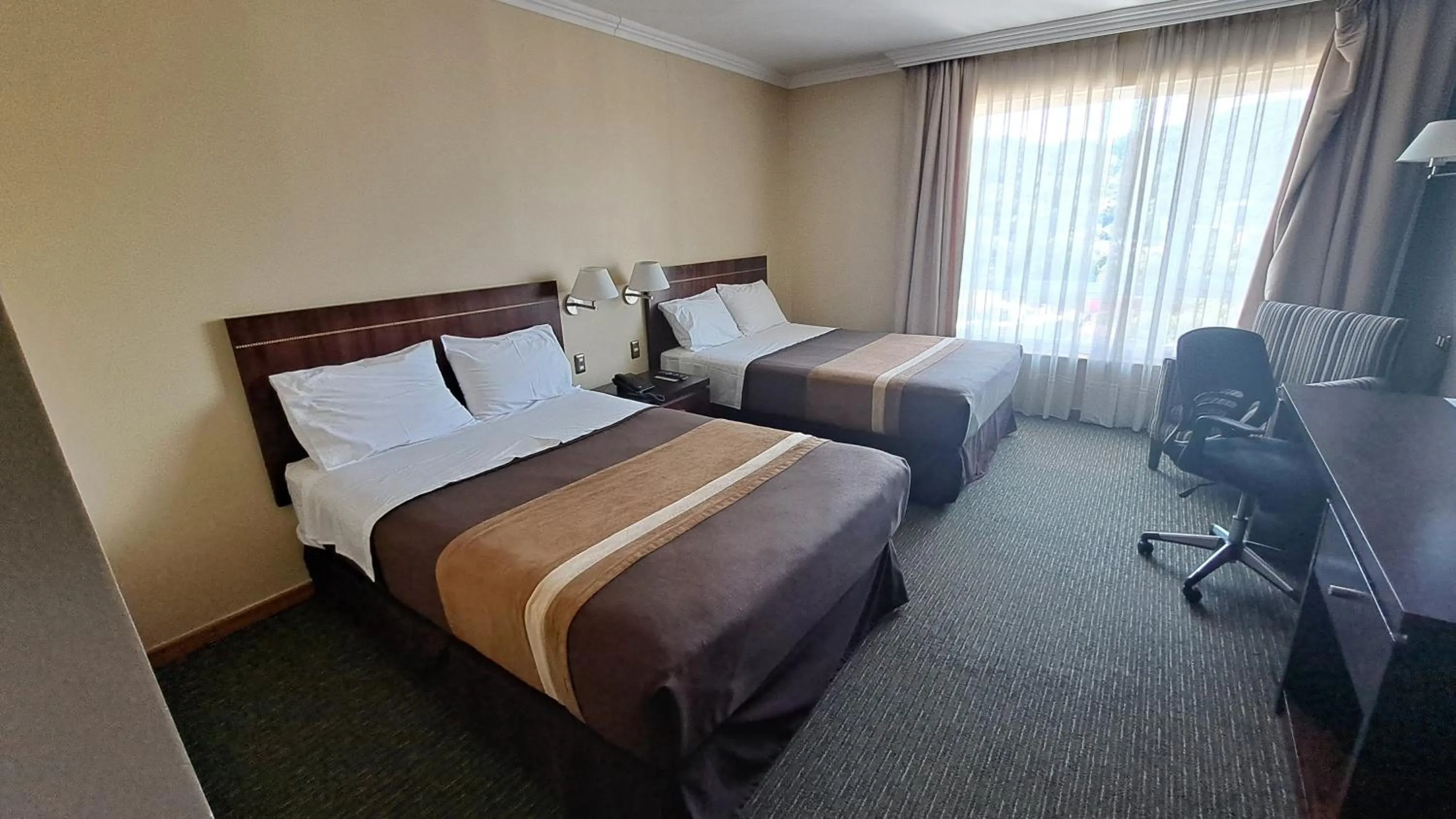 Queen Room with Two Queen Beds - single occupancy in Hotel Diego de Almagro Temuco