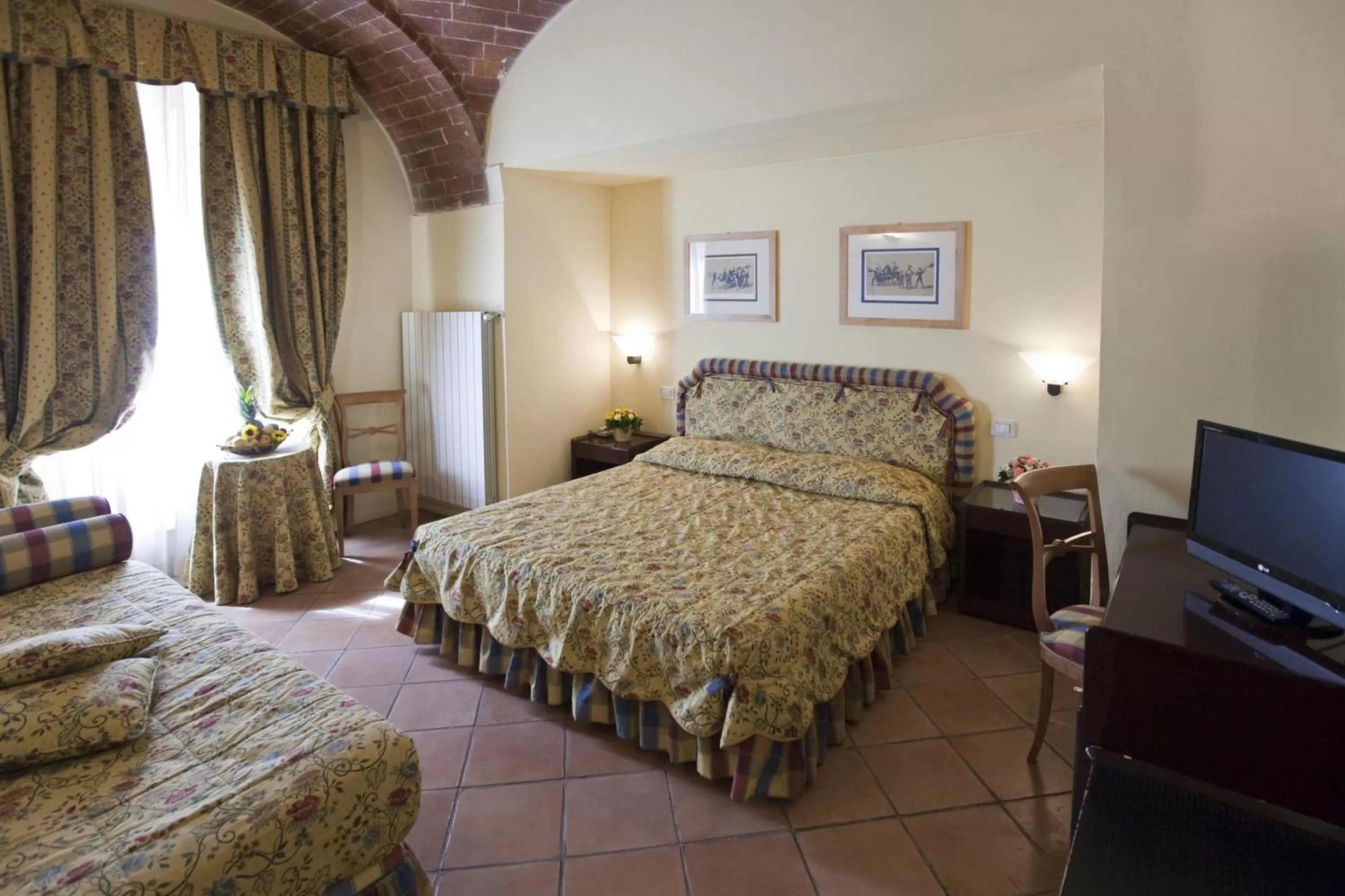 Quadruple Room in Hotel Italia
