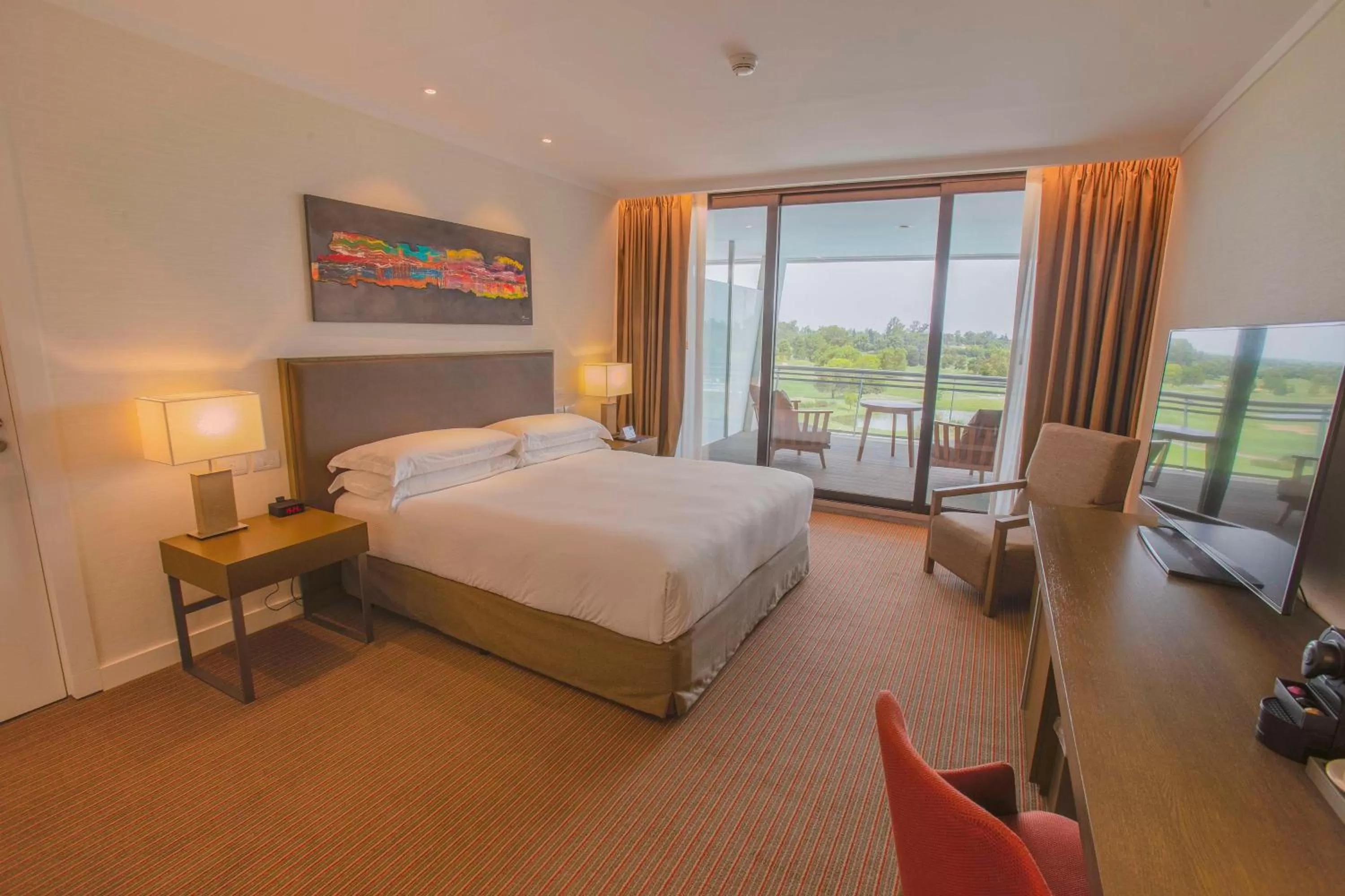 Premium King Room with Balcony - single occupancy in Hilton Pilar