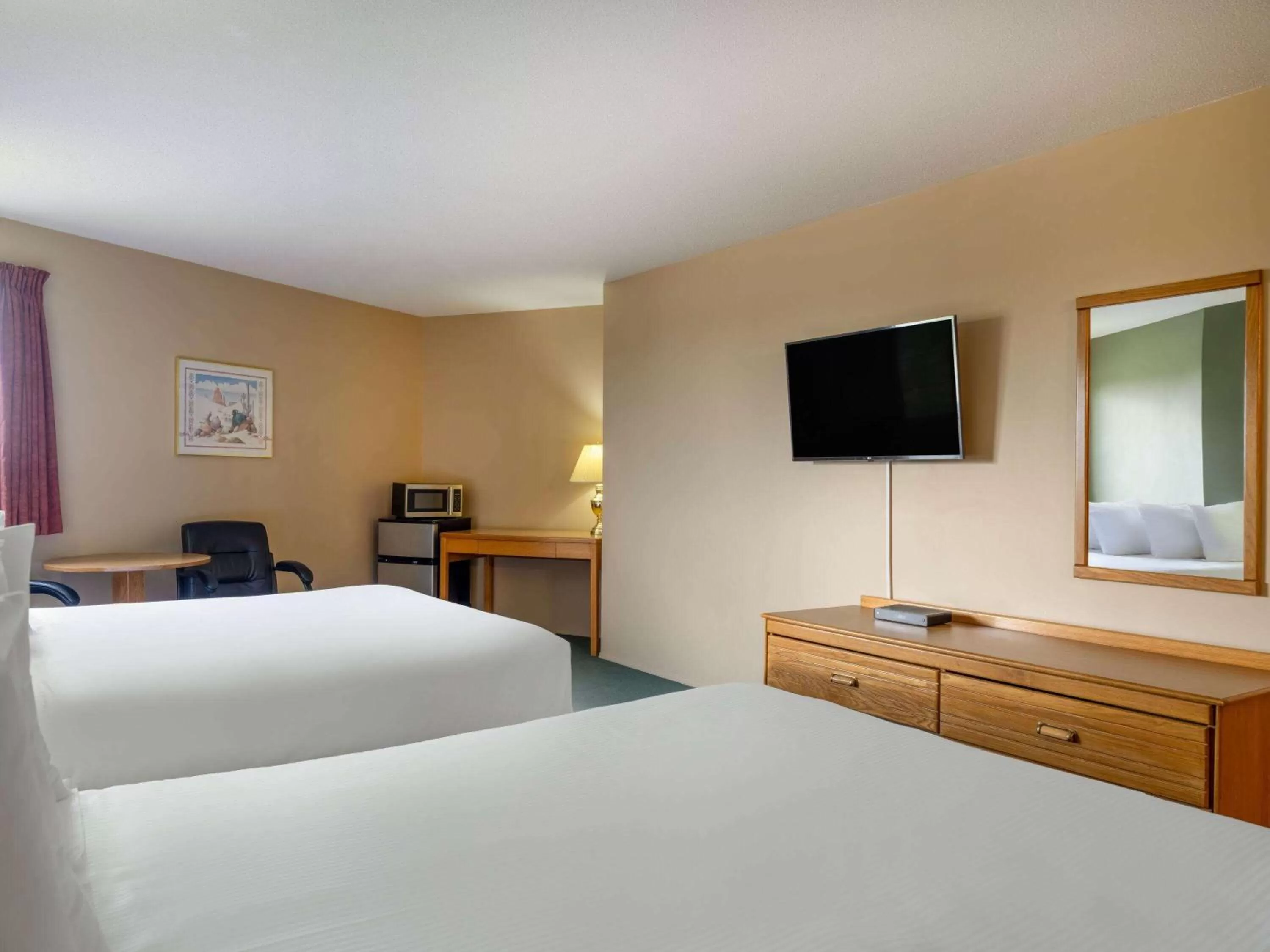 Deluxe Queen Room with Two Queen Beds - Non-Smoking in Travelodge by Wyndham Lacombe