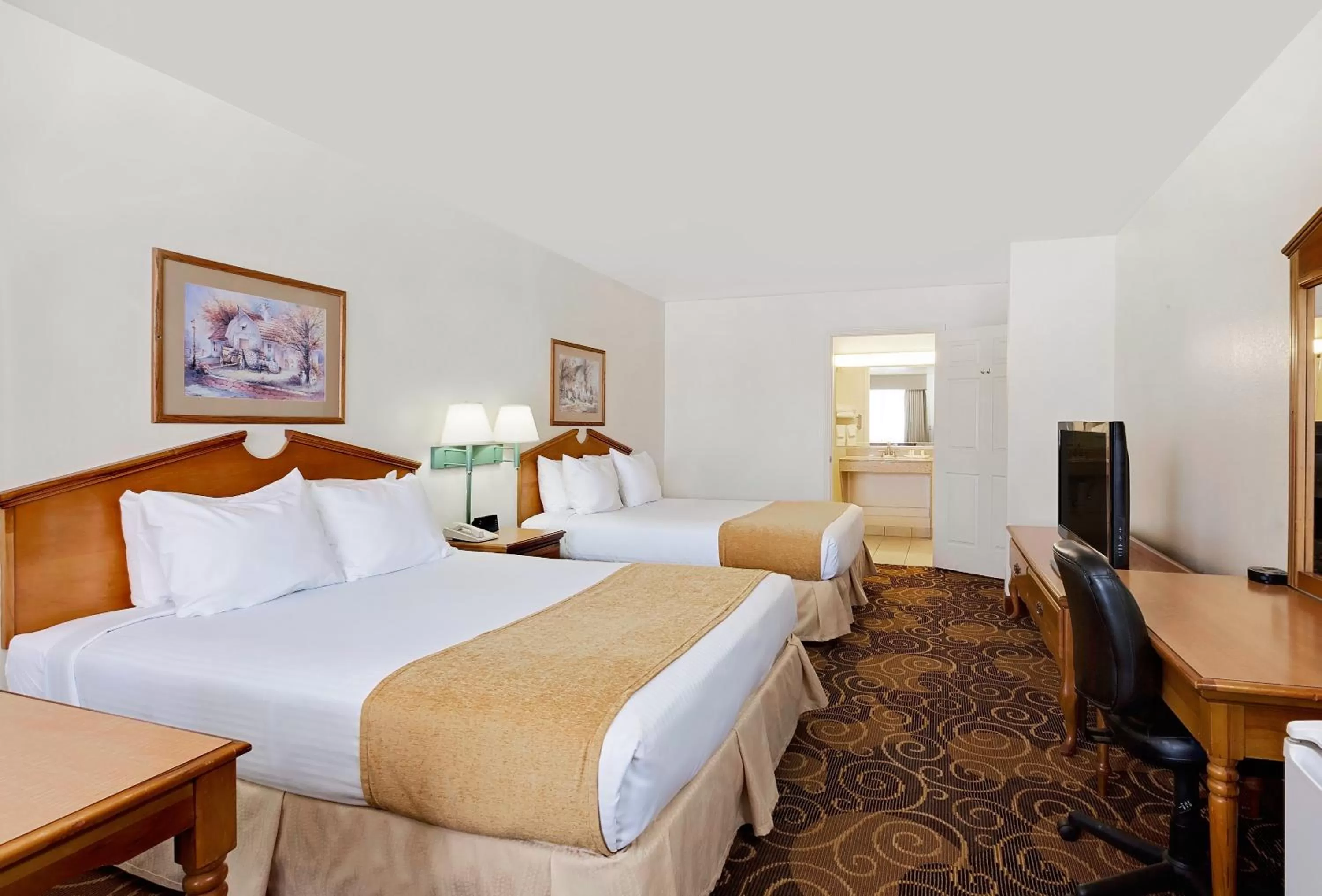 Queen Room with Two Queen Beds in Days Inn by Wyndham San Angelo