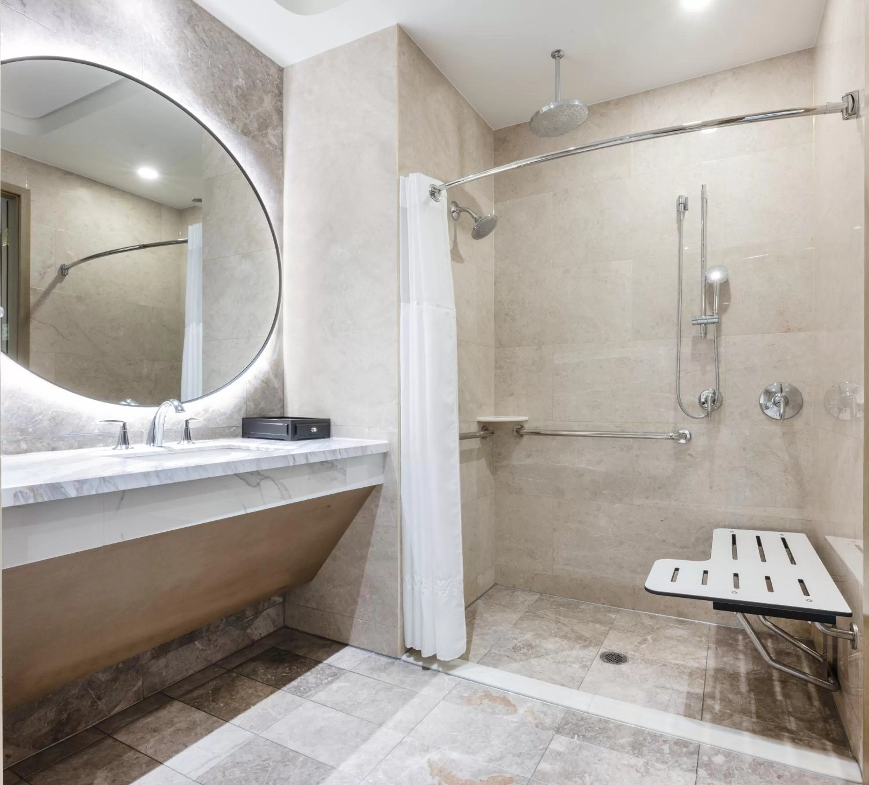 Deluxe ADA 1 King Studio with shower in Blossom Hotel Houston, Curio Collection by Hilton