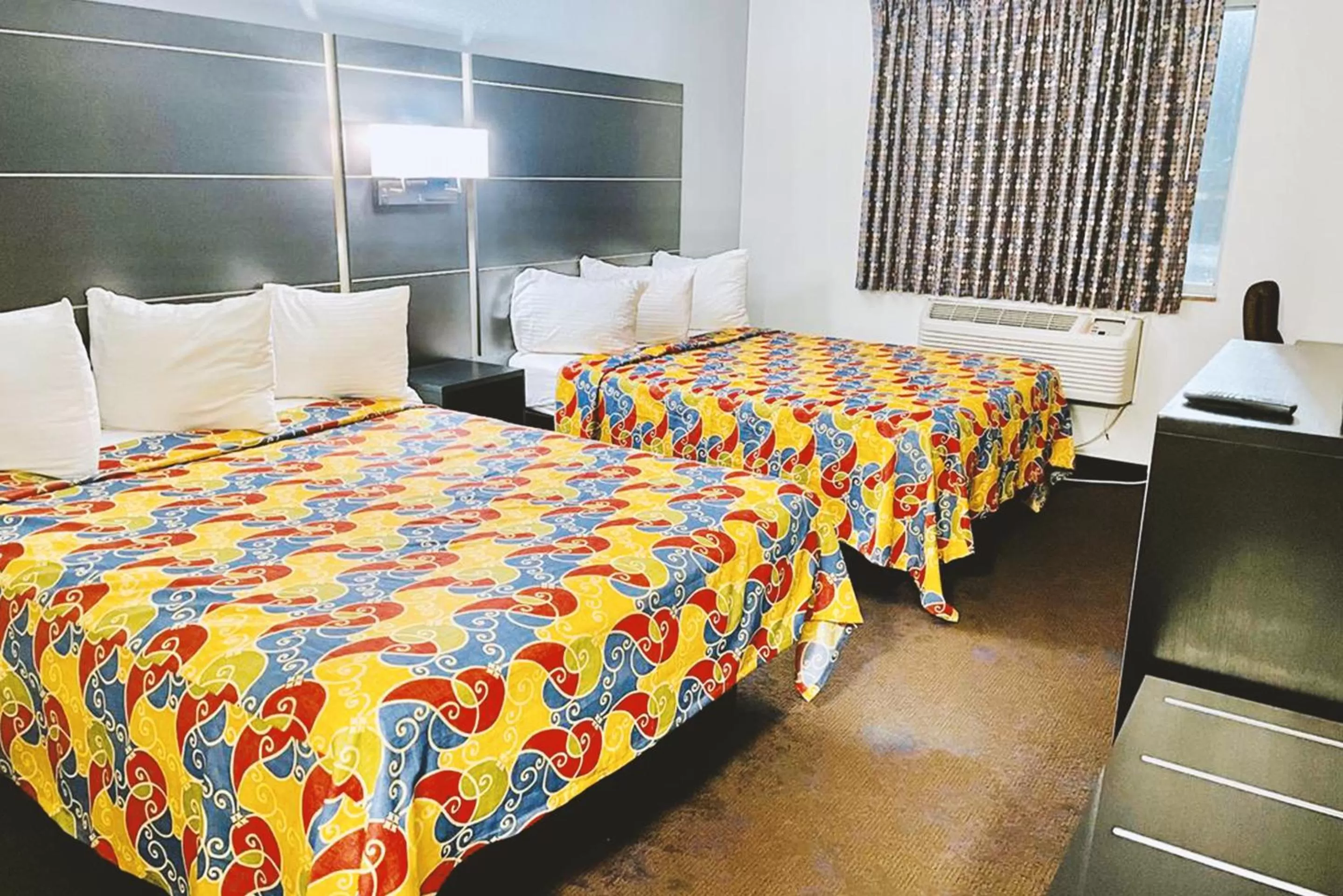 Queen Room with Two Queen Beds - Disability Access Non-Smoking in Coratel Inn & Suites by Jasper Northfield