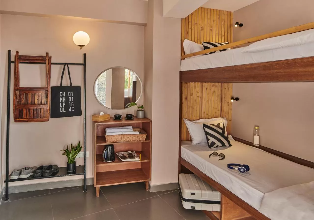Twin Room with Balcony in Minimalist Poshtel & Suites