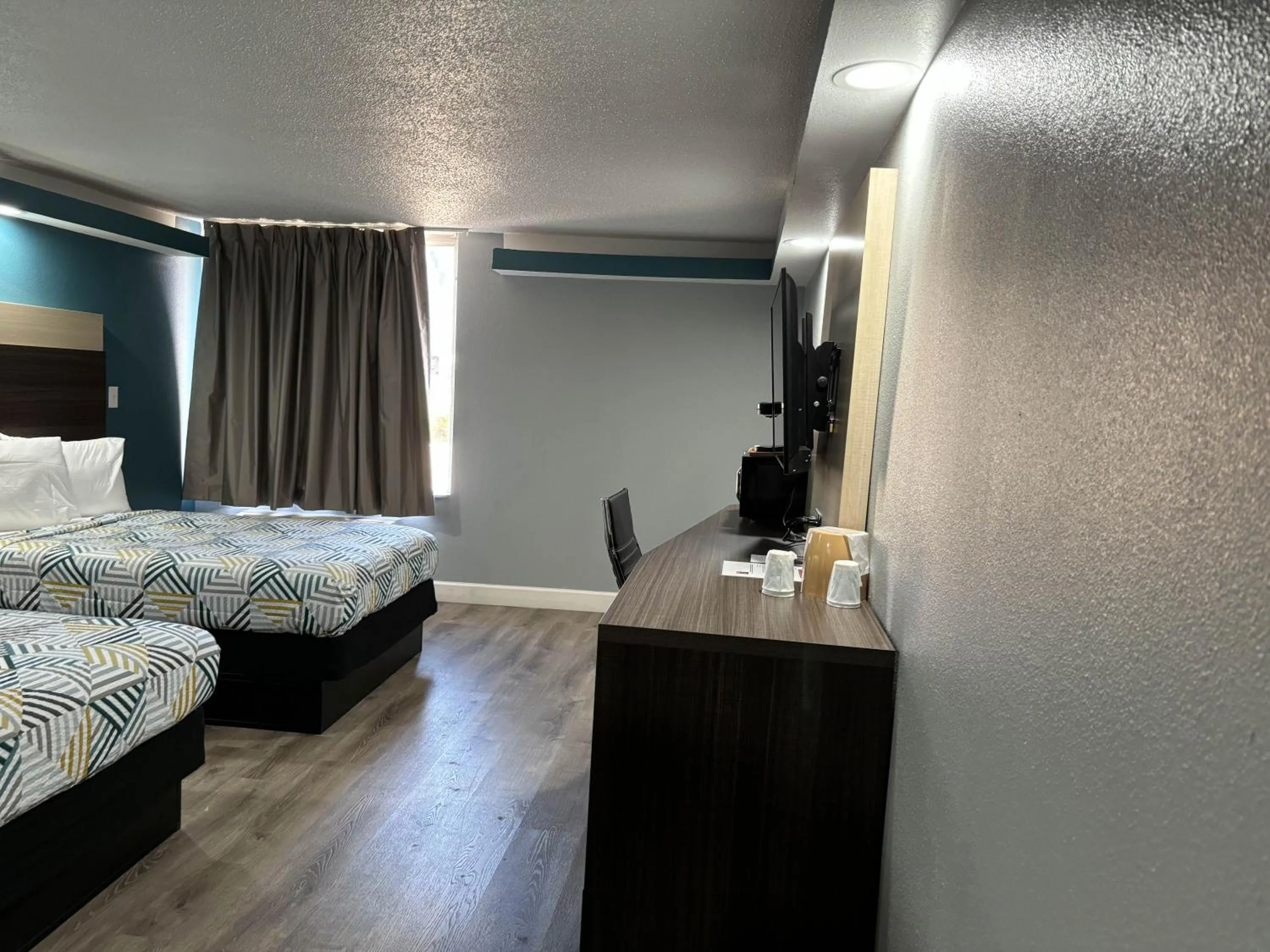 Queen Room with Two Queen Beds - Disability Access - Roll In Shower in Studio 6 Suites Memphis, TN East Memphis
