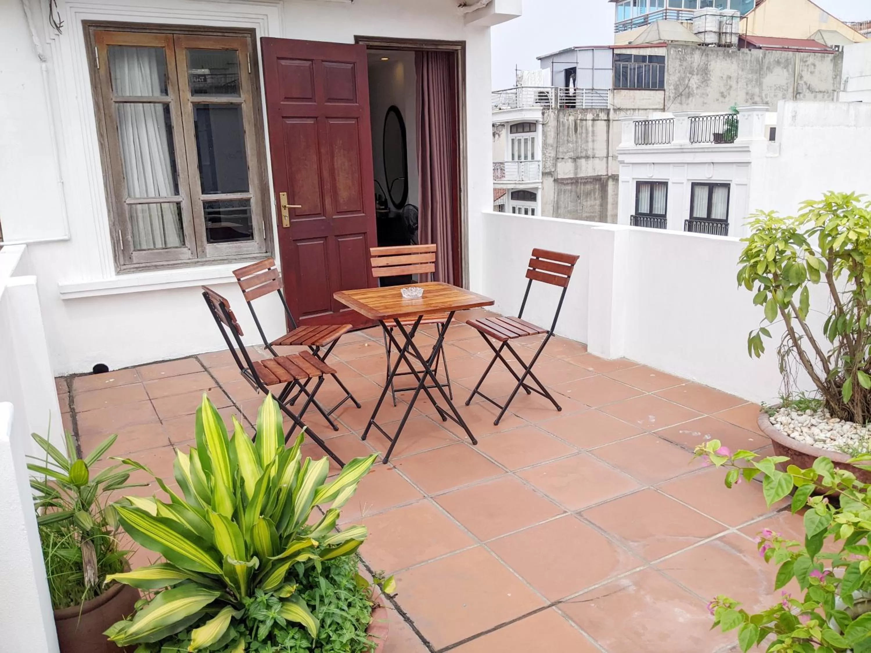 Quadruple Room with Terrace in Parklane Central Hanoi Hotel