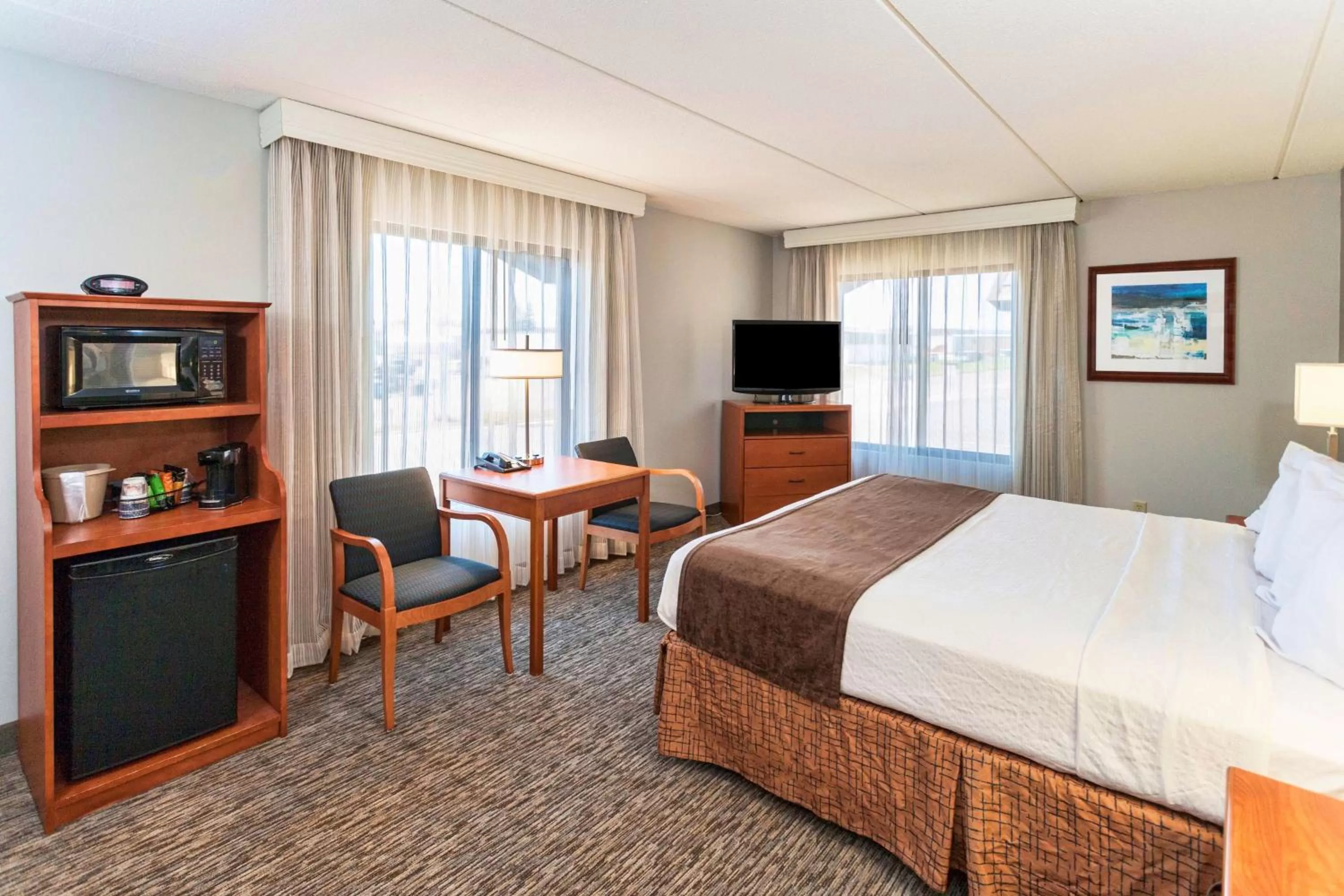 King Suite with Mobility Accessible Roll-In Shower and Balcony in Best Western Bridgeview Hotel
