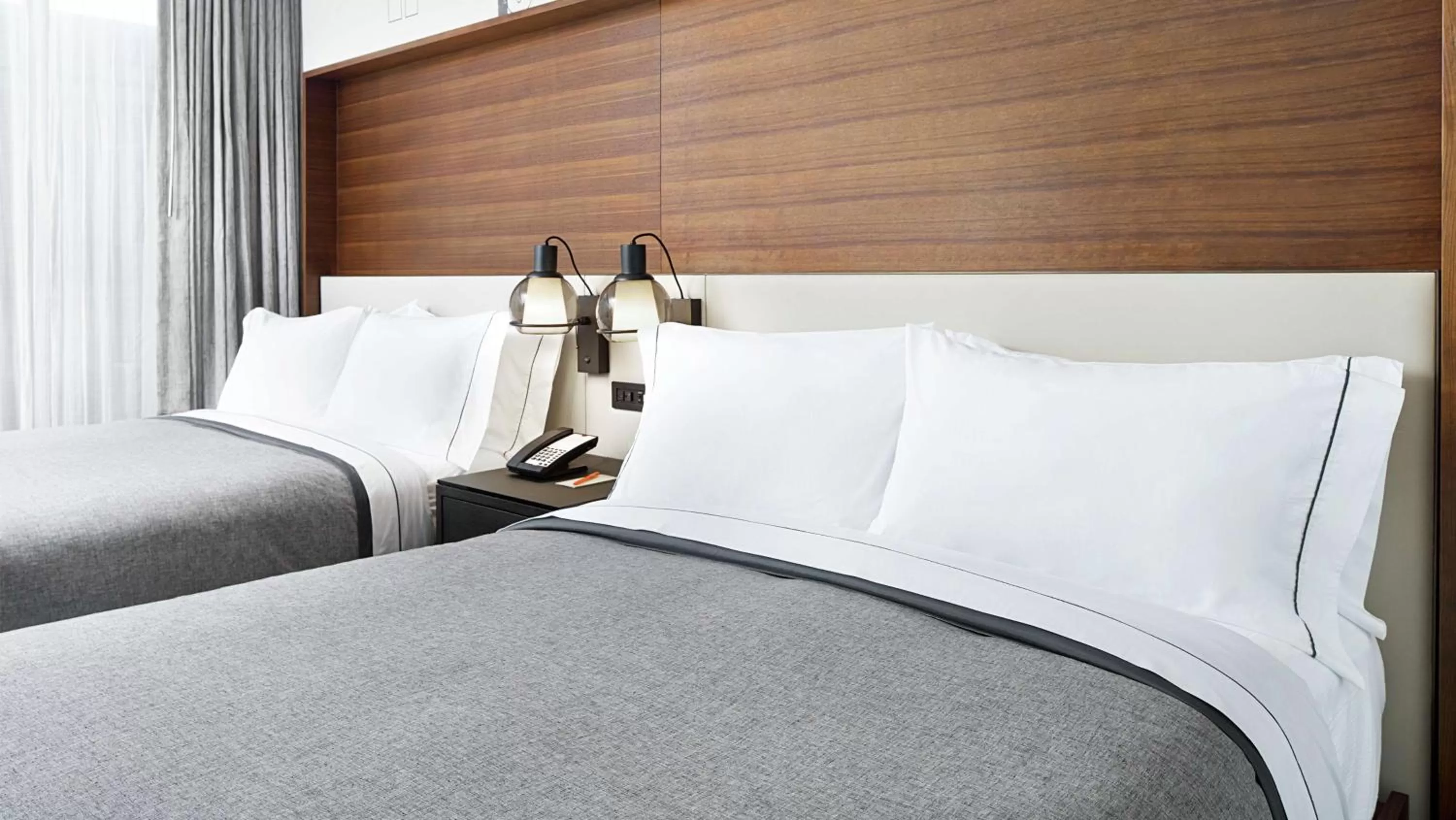 Queen Room with Two Queen Beds - Mobility/Hearing Accessible with Roll-In Shower in Canopy By Hilton Atlanta Midtown