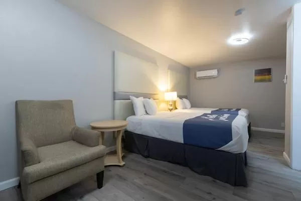 Bed in Sunglow Motel