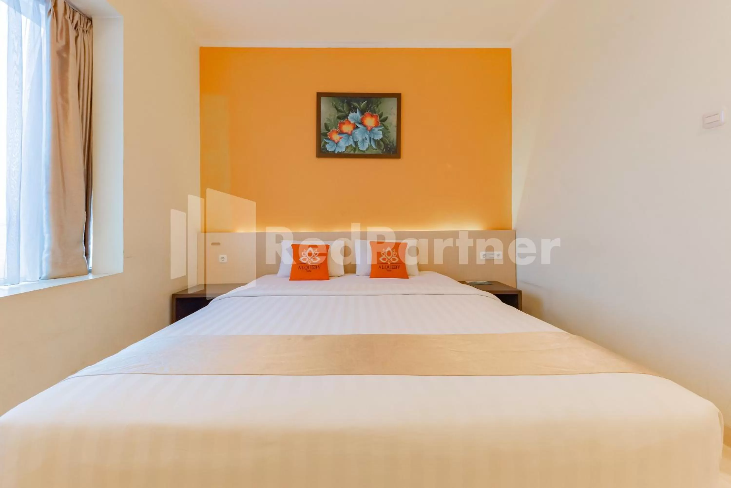 Standard Double Room in Alqueby Hotel near Kiara Artha Park & Trans Studio Mall Mitra RedDoorz