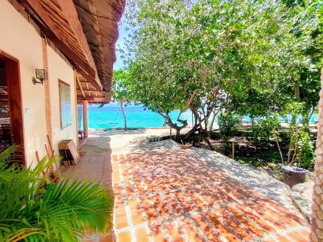 Deluxe Double Room with Side Sea View in Moalboal T Breeze Coastal Resort