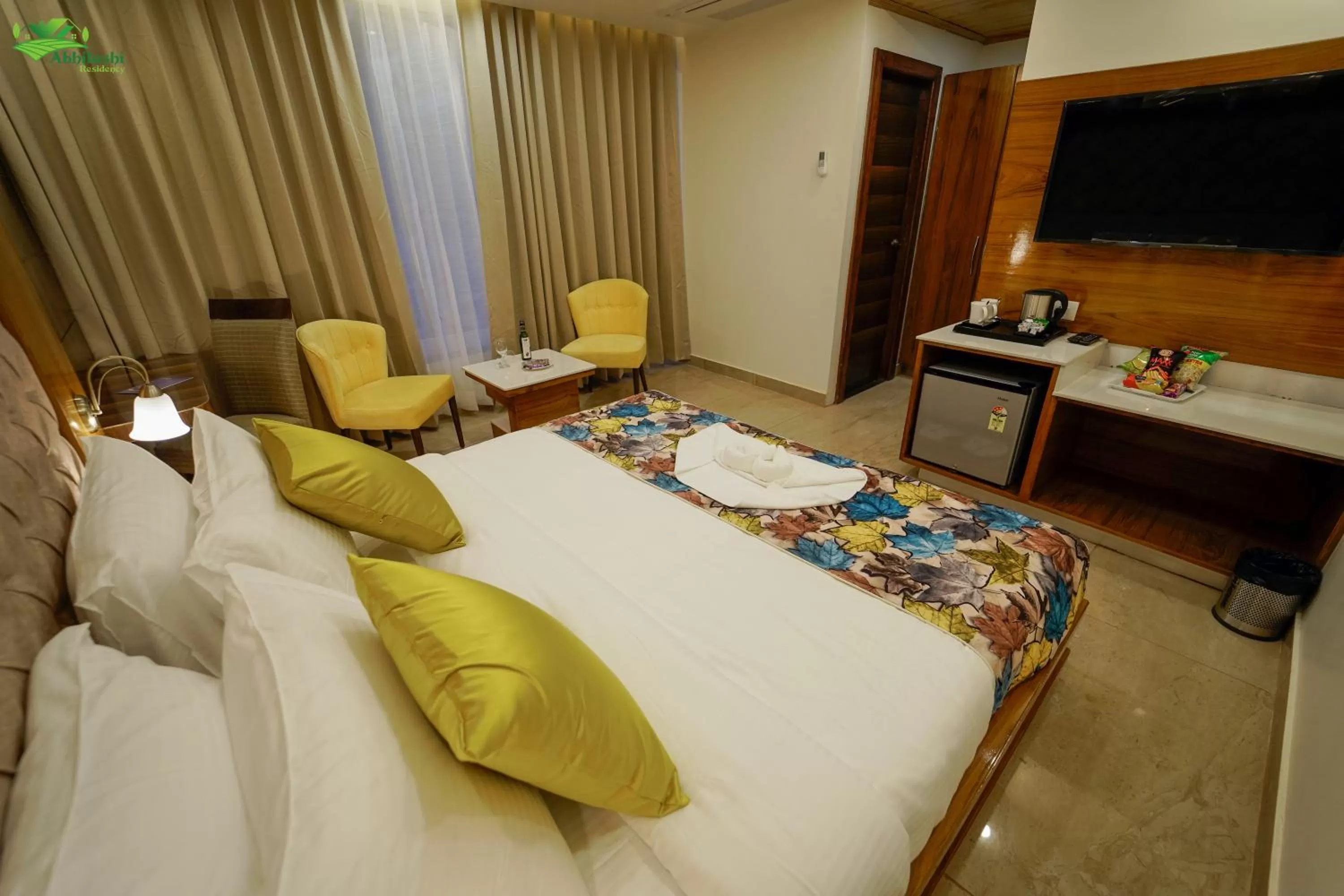 Deluxe Room in Abhilashi Residency & Spa - Centrally Heated & Air Cooled