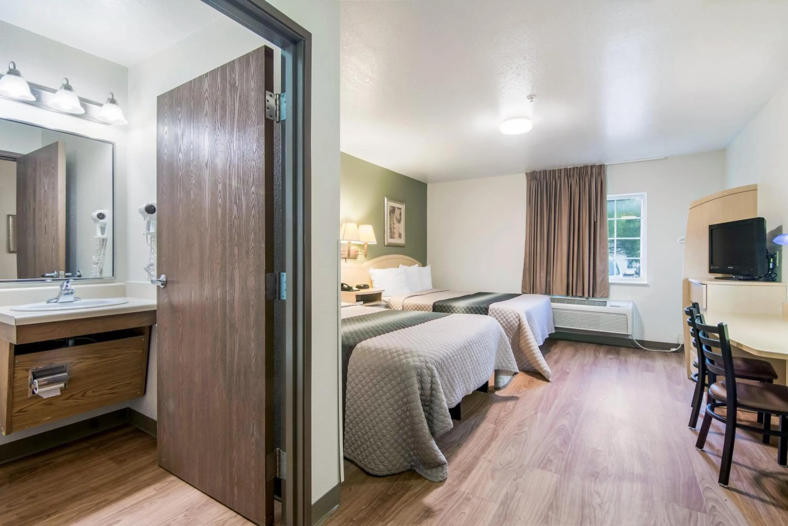 Studio Room with Two Queen Beds Smoking          in HomeTowne Studios & Suites by Red Roof Bentonville