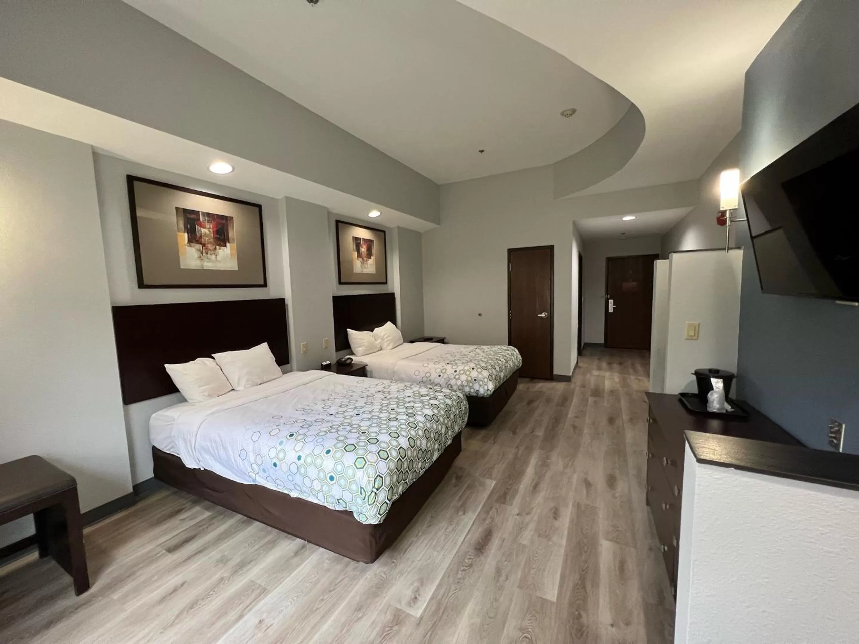 Suite with One King Bed and One Double Bed with Kitchenette Non-Smoking in HomeTowne Studios & Suites Washington