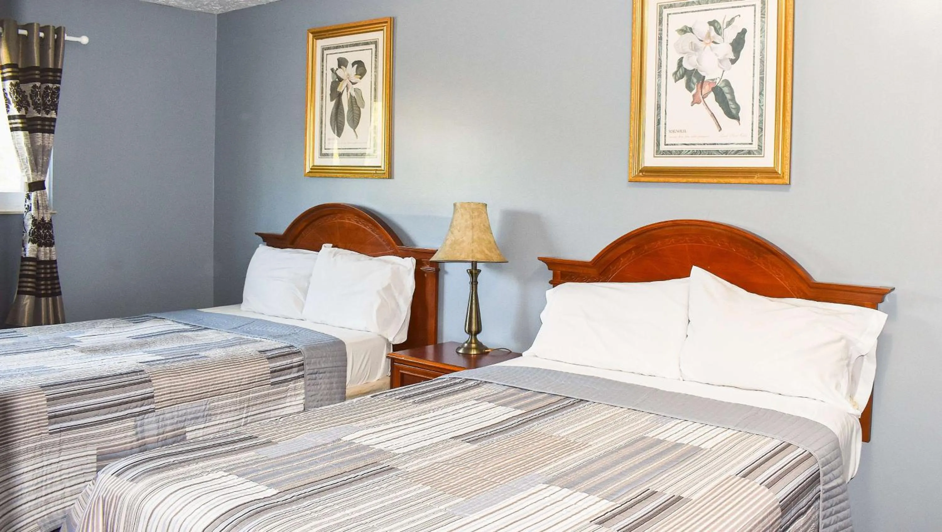 Double Suite with Two Double Beds in Magnuson Hotel Extended Stay Canton Ohio