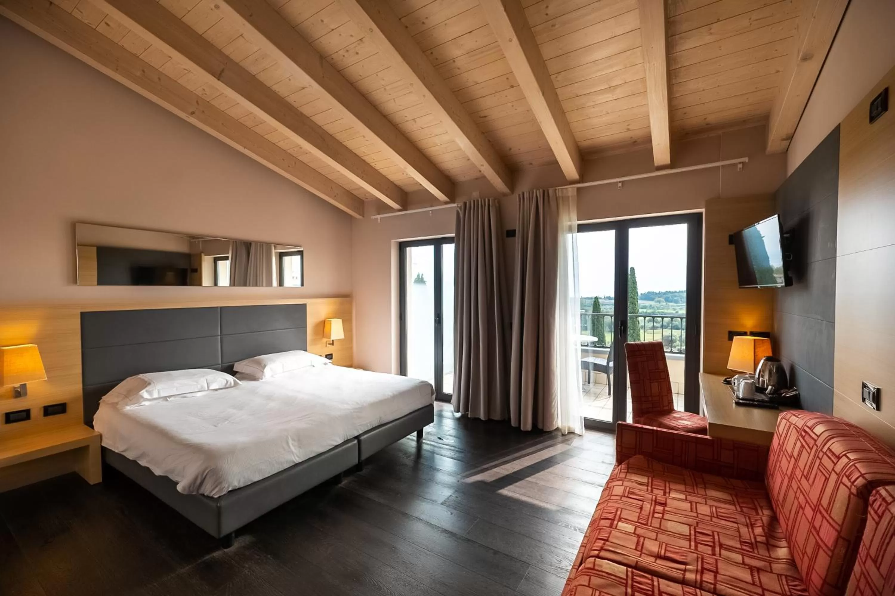 Superior Triple/Quadruple Room with Lake View and Balcony in Villa Luisa Resort & Luxury Apartments