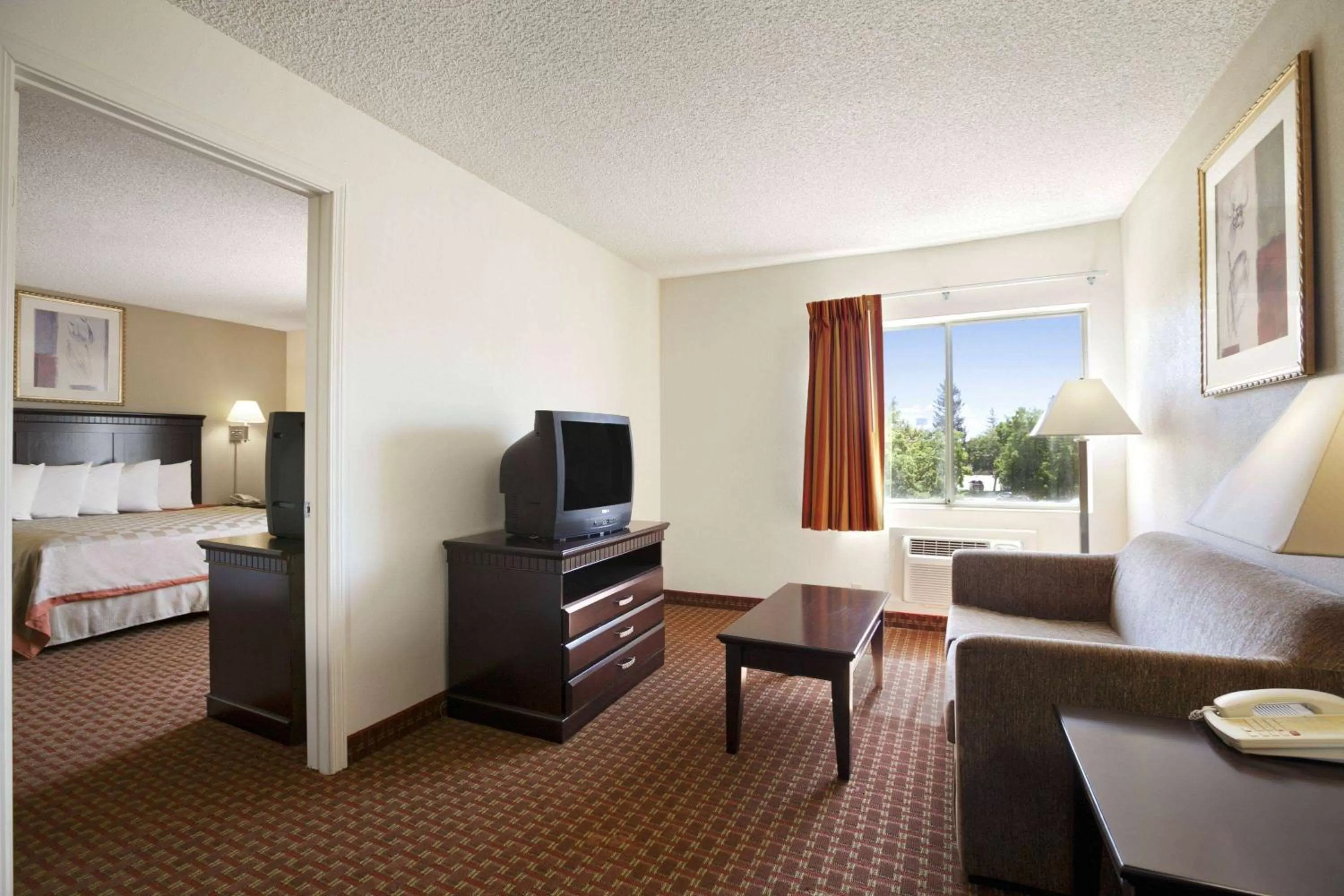 Two-Room King Suite - Non Smoking in Days Inn & Suites by Wyndham Rancho Cordova