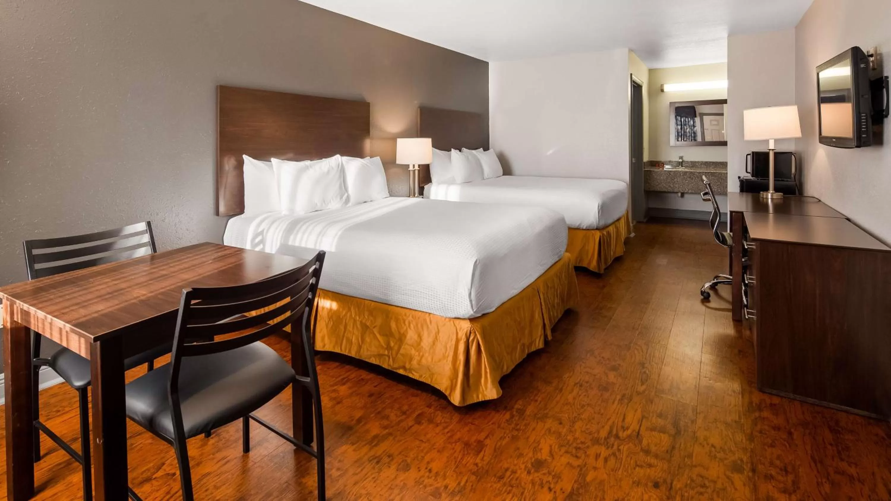 Queen Room with Two Queen Beds in SureStay Plus Hotel by Best Western Hammond