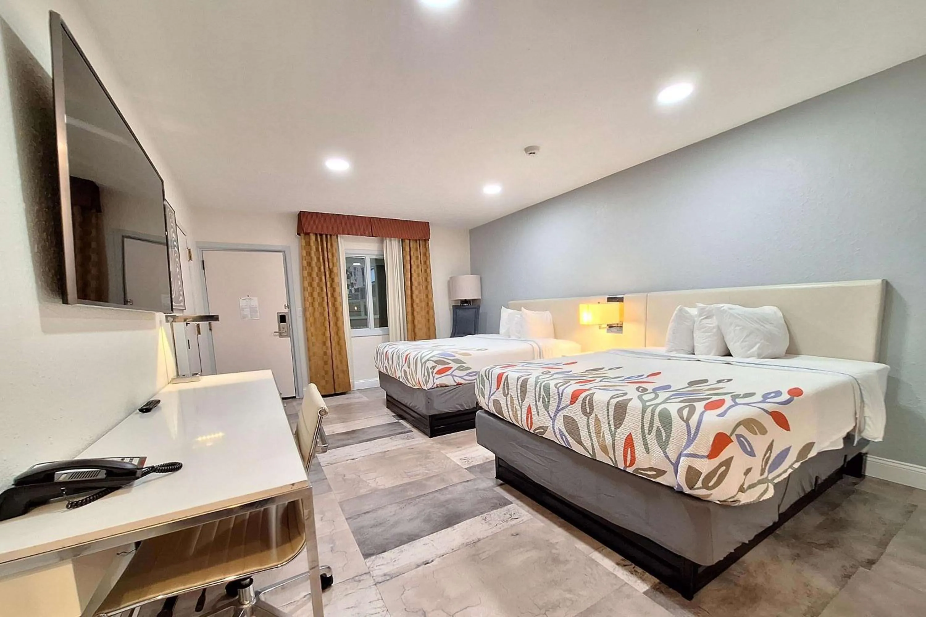 Queen Room with Two Queen Beds and Poolside View - Non-Smoking in Travelodge by Wyndham Indianapolis Speedway