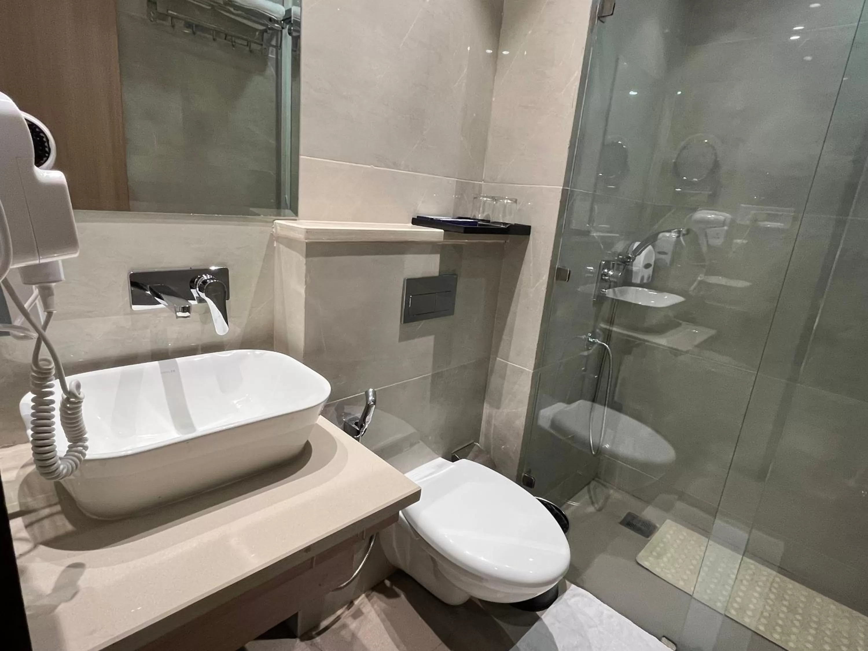 Bathroom in Hotel RRV with Free Parking