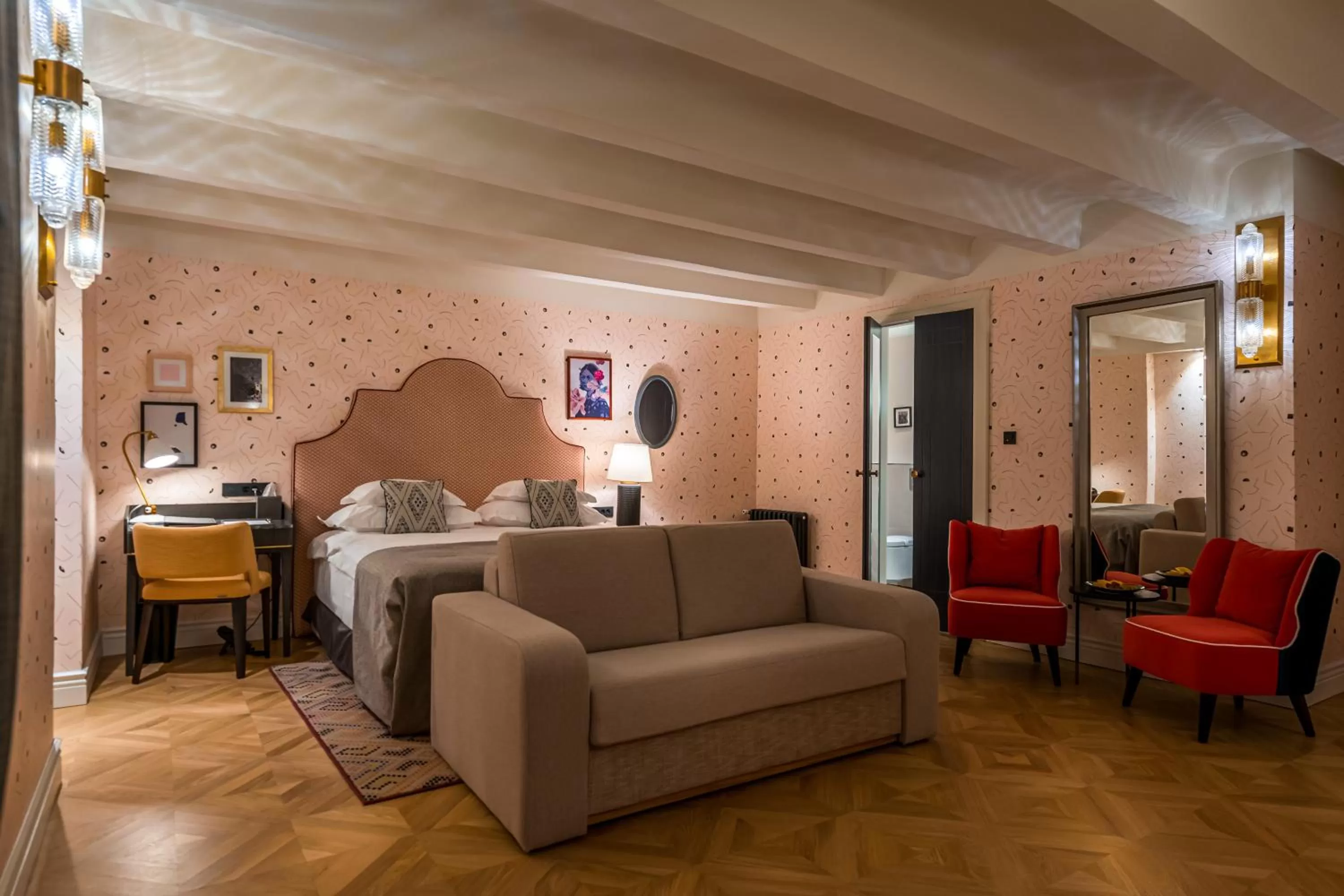 Superior Room Atrium View with sofa in Hotel Capital