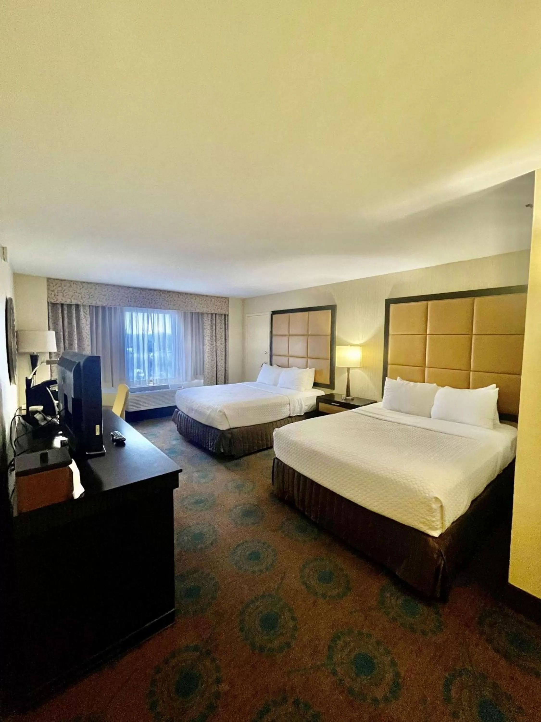 Queen Room with Two Queen Beds and Mobility Accessible Roll-In Shower in Brandywine Plaza Hotel - SureStay Collection by Best Western
